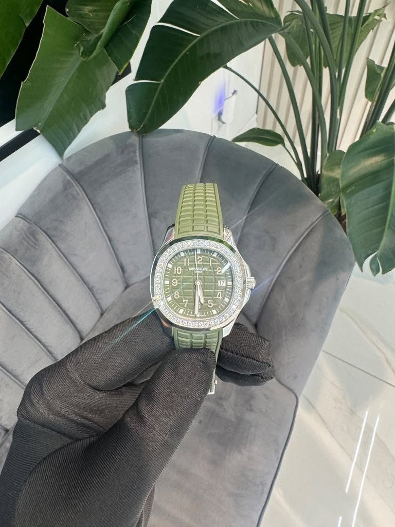 May be an image of wrist watch and text