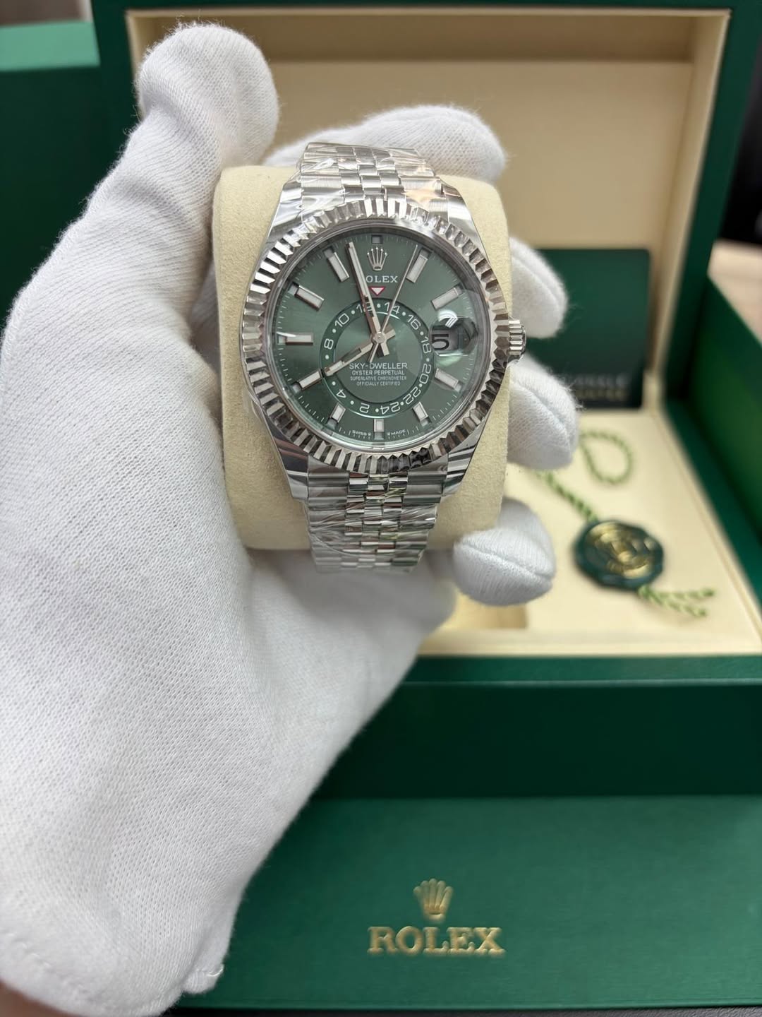 May be an image of wrist watch and text