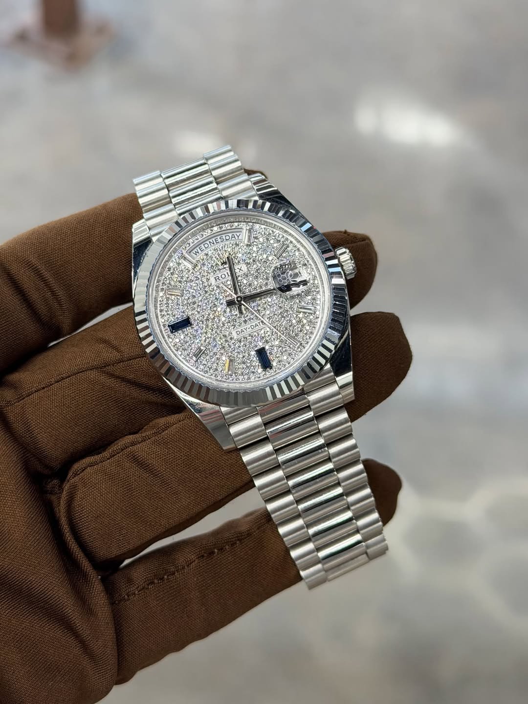 May be an image of wrist watch and text