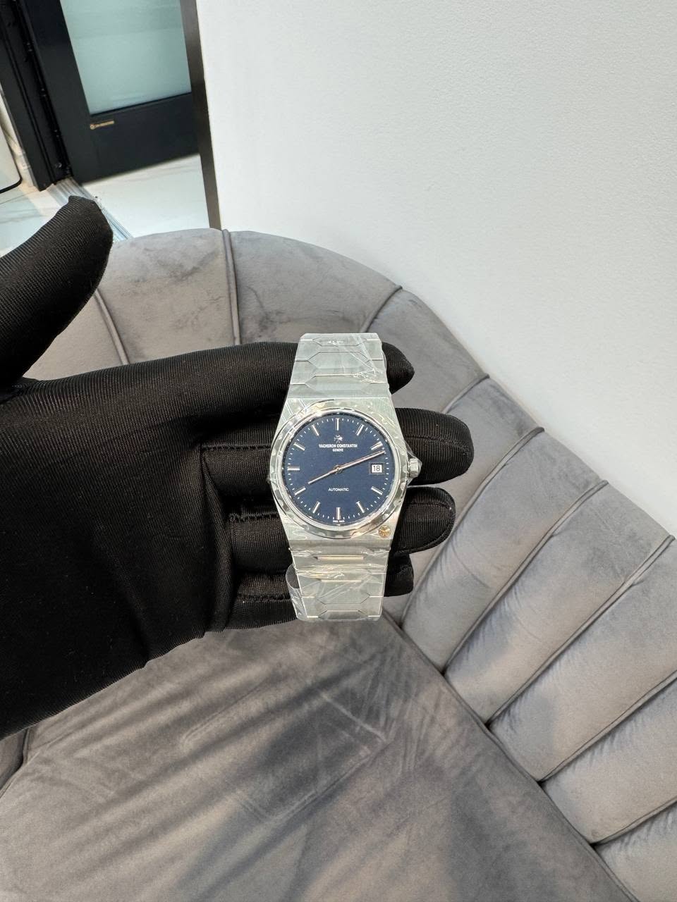May be an image of wrist watch and text