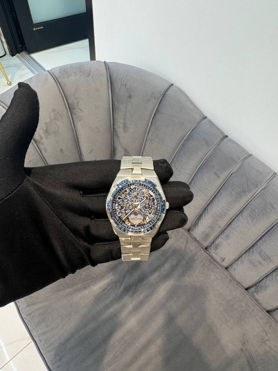 May be an image of wrist watch and text