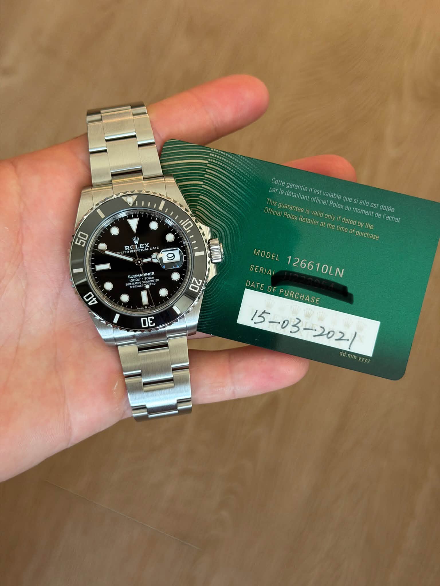 May be an image of wrist watch and text that says '50 10 RC CLEX LE 9 とた。 Retariera thetme the Cette negarantien estv par detaullant officiel officiel alable Rolex ues elle momentd…