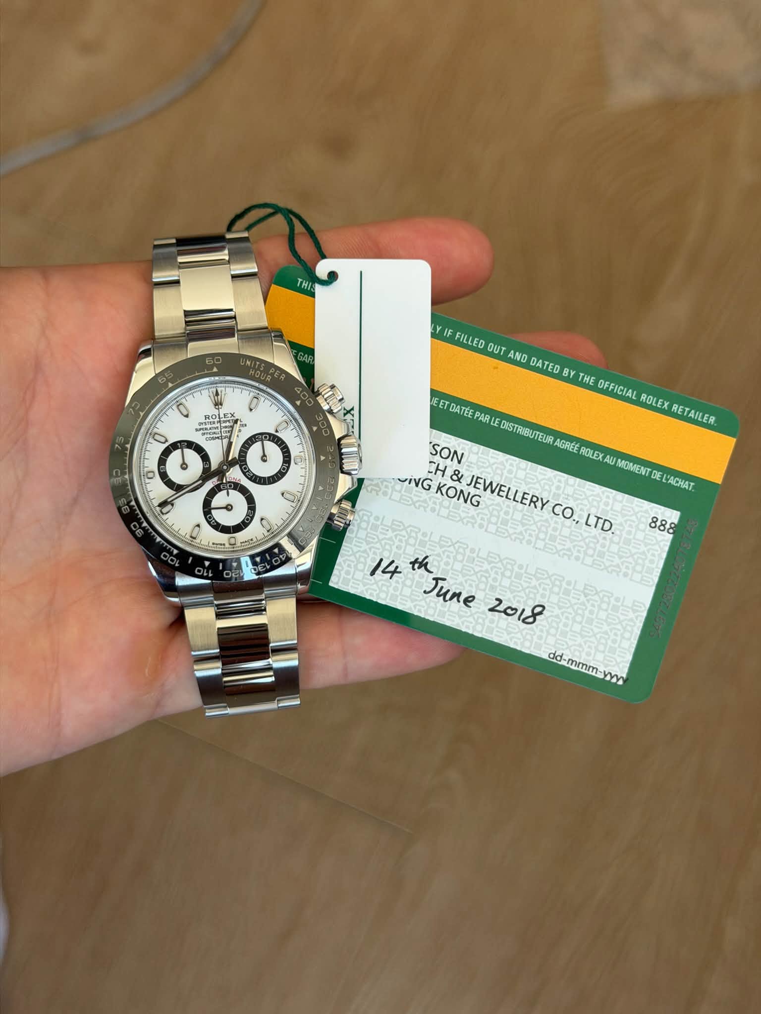 May be an image of wrist watch and text
