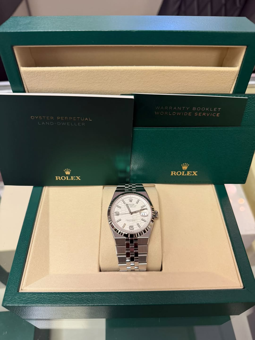 May be an image of wrist watch and text