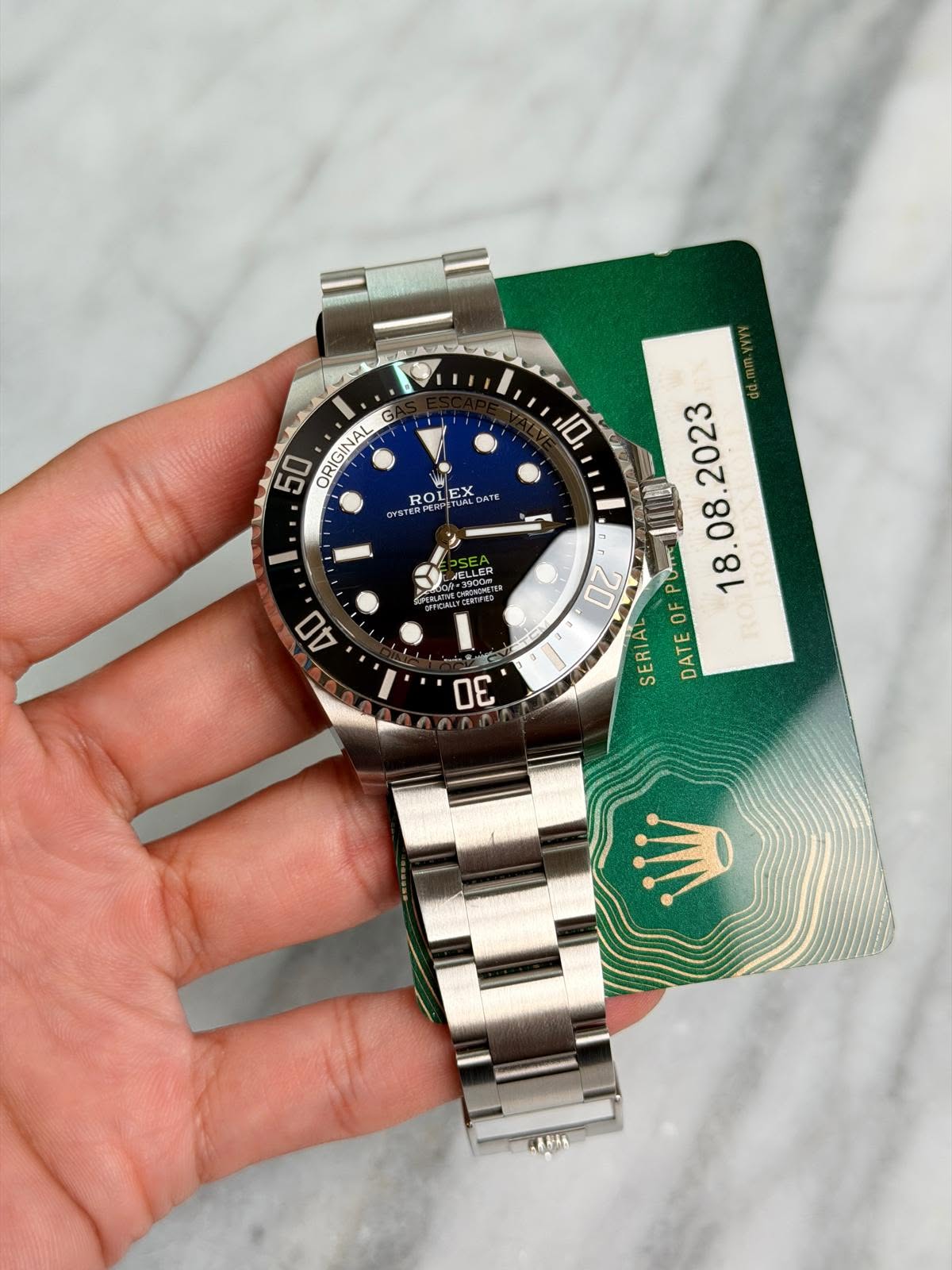 May be an image of wrist watch and text that says '10 50 ORIGINAL I ROLEX OLEX WSTE STERPE 40 Oms Pu OF SERIA DATE RO 30'