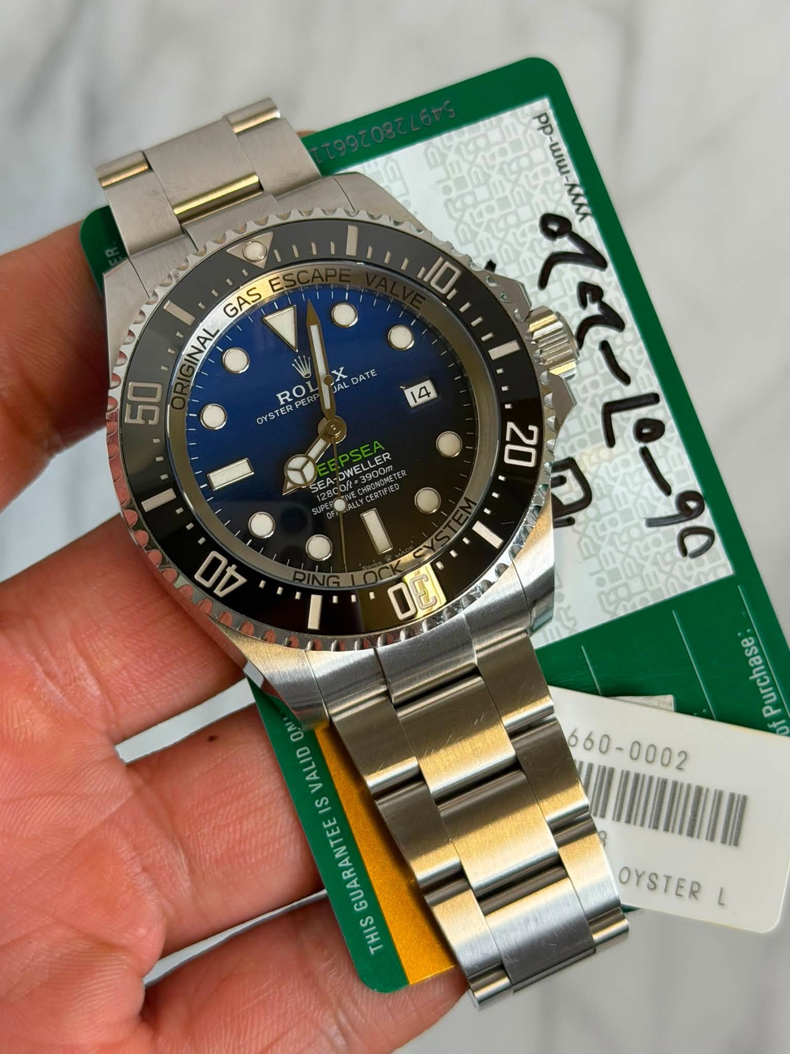 May be an image of wrist watch and text that says 'E GAS NAL 50 X ROL OYSTER vy-mm-dd dd mm-dd 14 DWELLER OWE 20 SEA ててーピー90 ፈ mX 30 10 مططه Purchase 4O ON VALID S GUARANTEE…