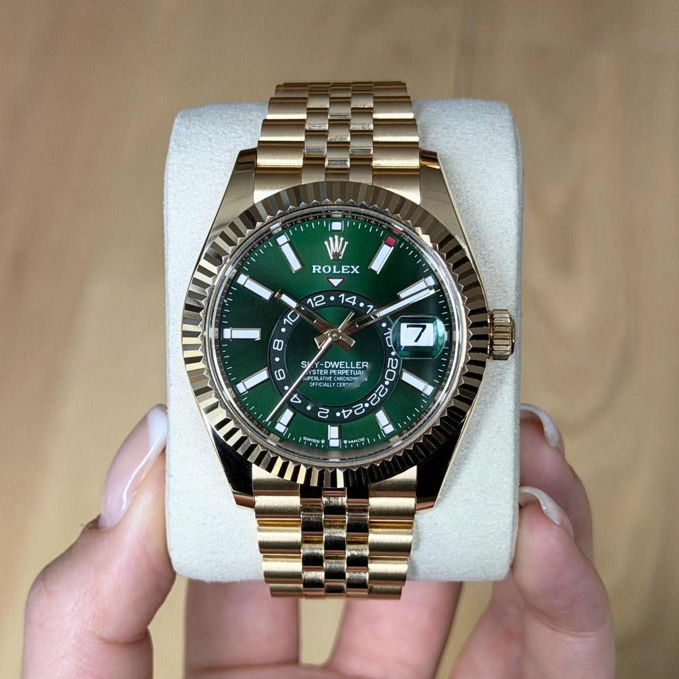 May be an image of wrist watch and text
