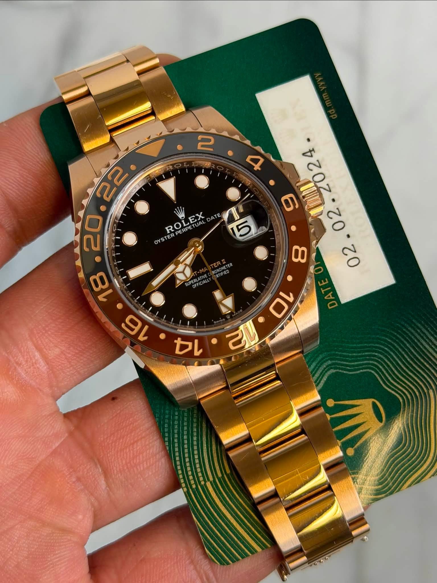 May be an image of wrist watch and text that says '2 ROLEX EX ROL YSTER PERPETUAL ۰'