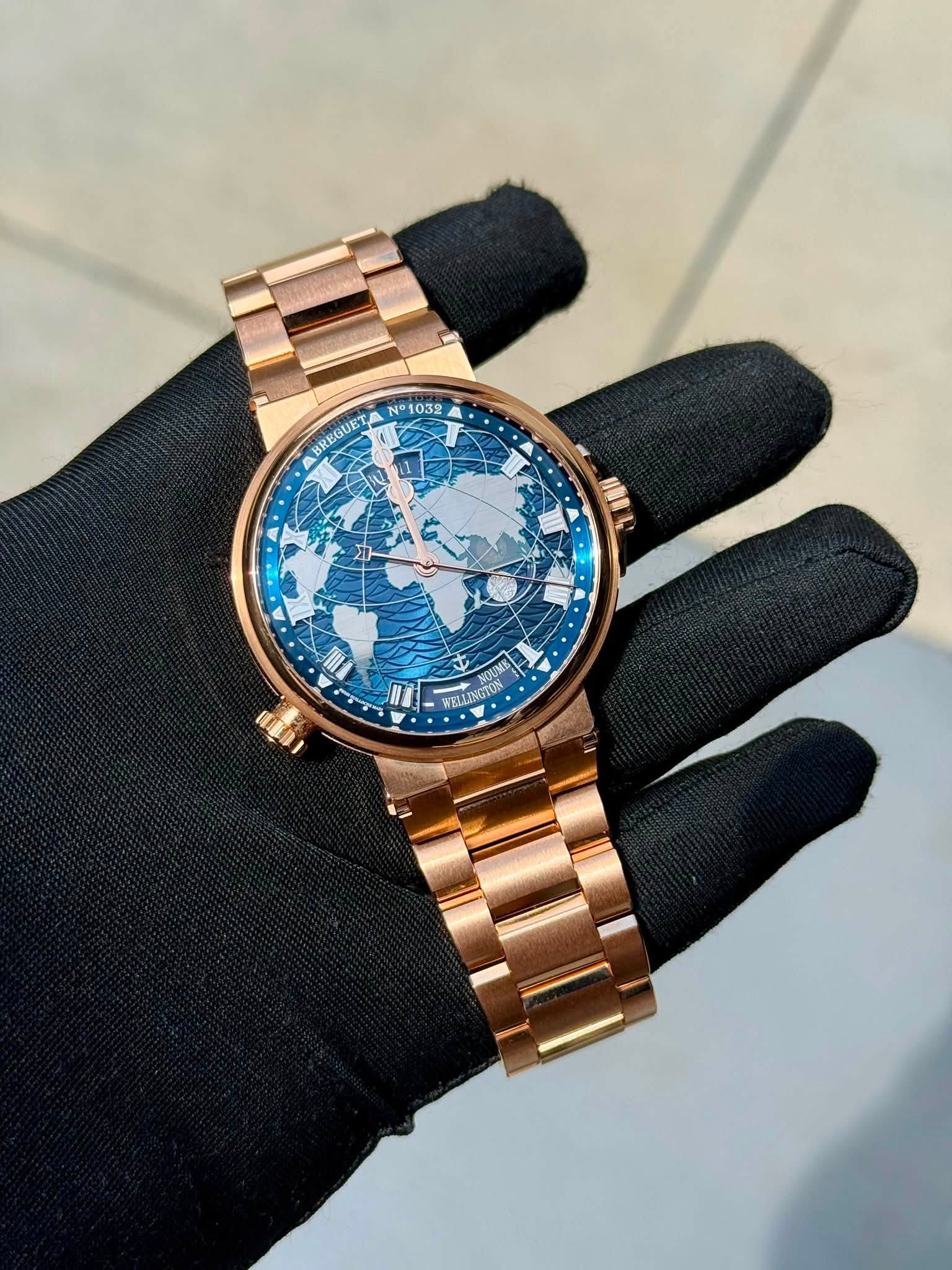 May be an image of wrist watch and text
