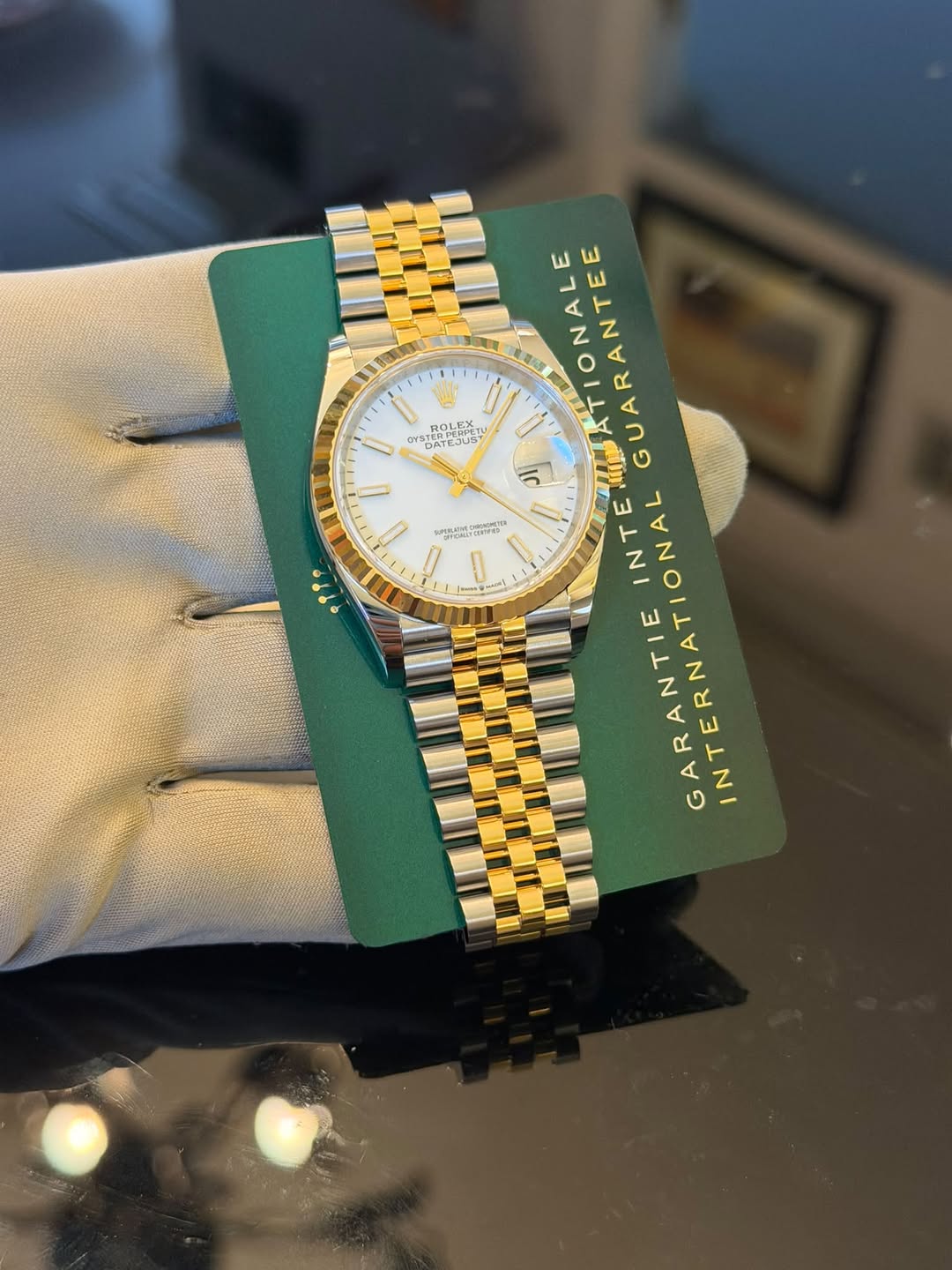 May be an image of wrist watch and text that says '0 UYST T TER STERDER ROLSE1 ሎ 5 IITTIONALE TIONALE RANTEE GUARANTE иTKmTb i INTE TERNATIONAL GARANTIE ANTIE TIONAL INTERNATIONAL…
