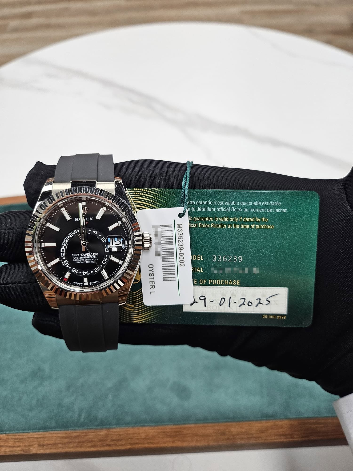 May be an image of wrist watch and text that says 'πτα EX D etta garantie n'est que lle afelleest est datáa adetaill oflicie Acex Acexau marentda achat guerantebisva svalidnlyf…