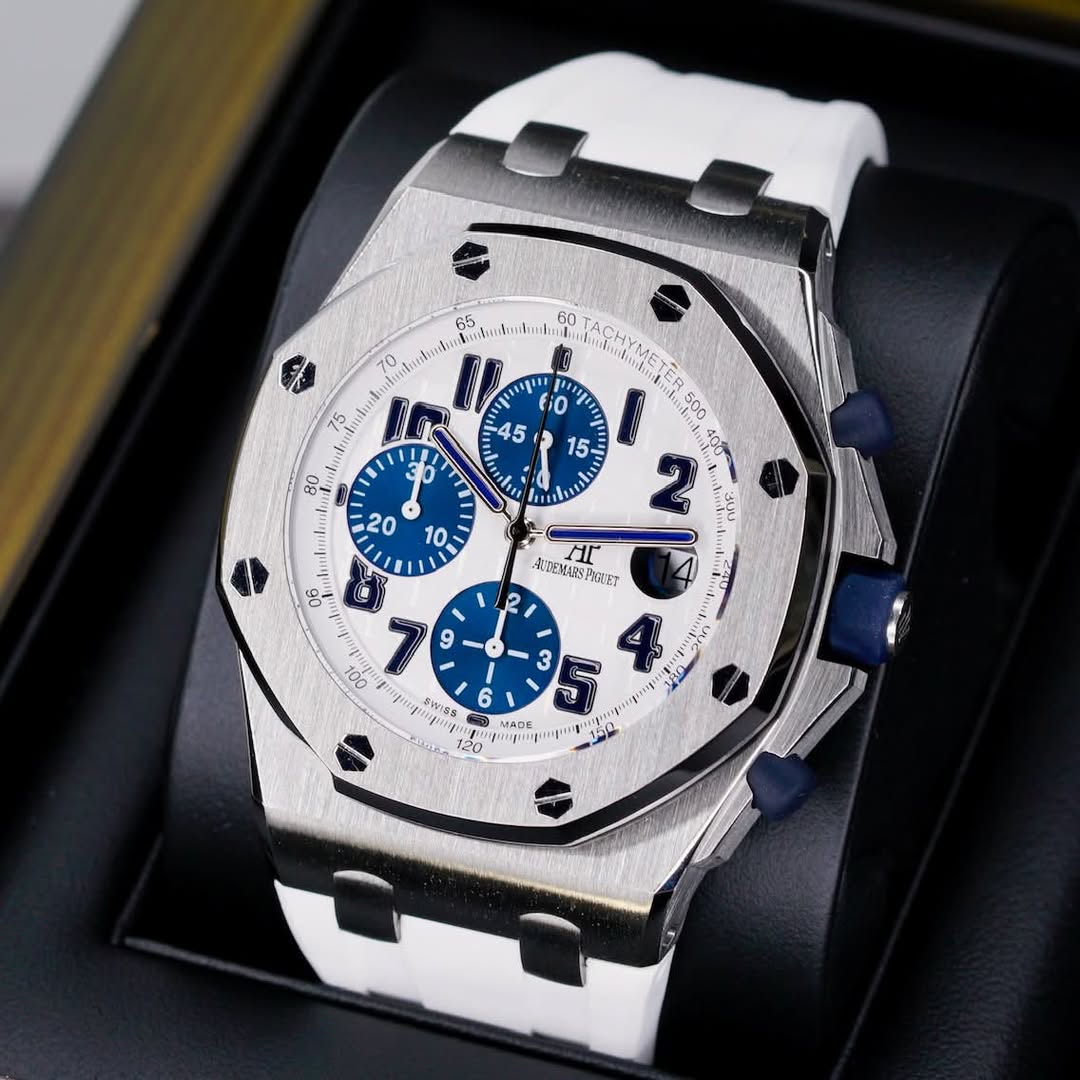 May be an image of wrist watch and text