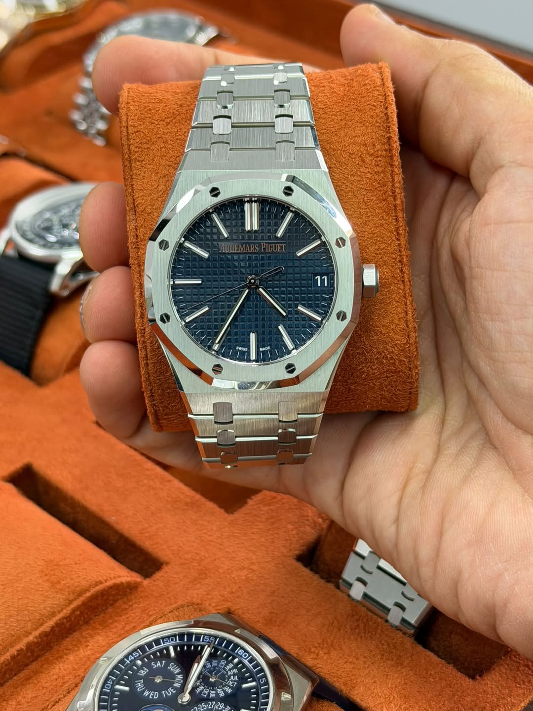 May be an image of wrist watch and text