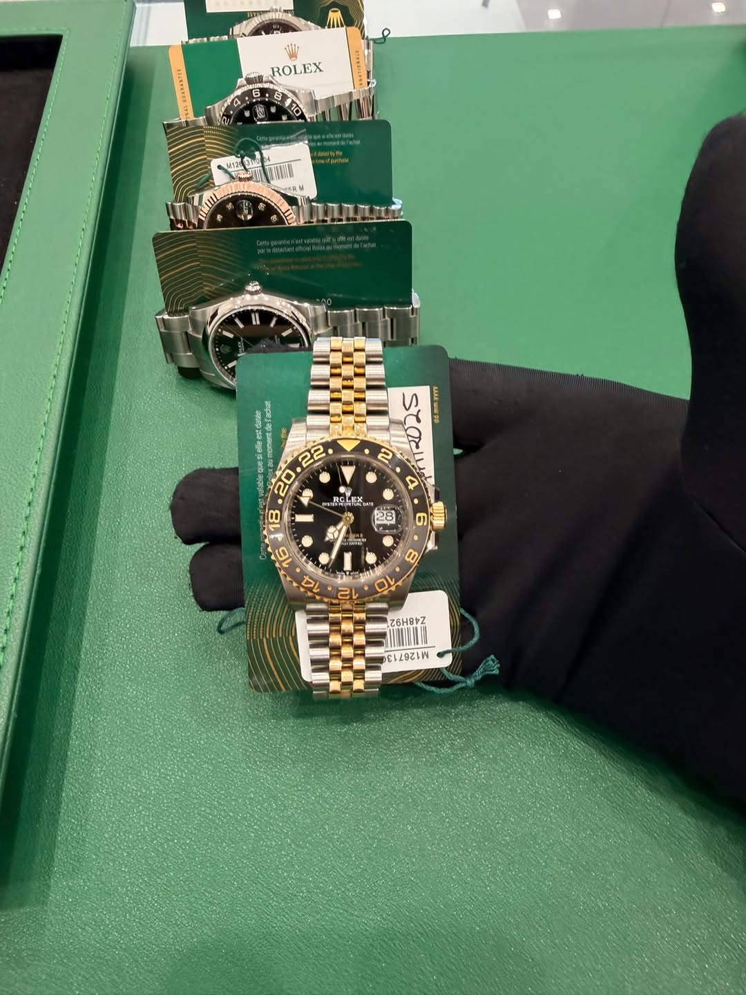 May be an image of wrist watch and text