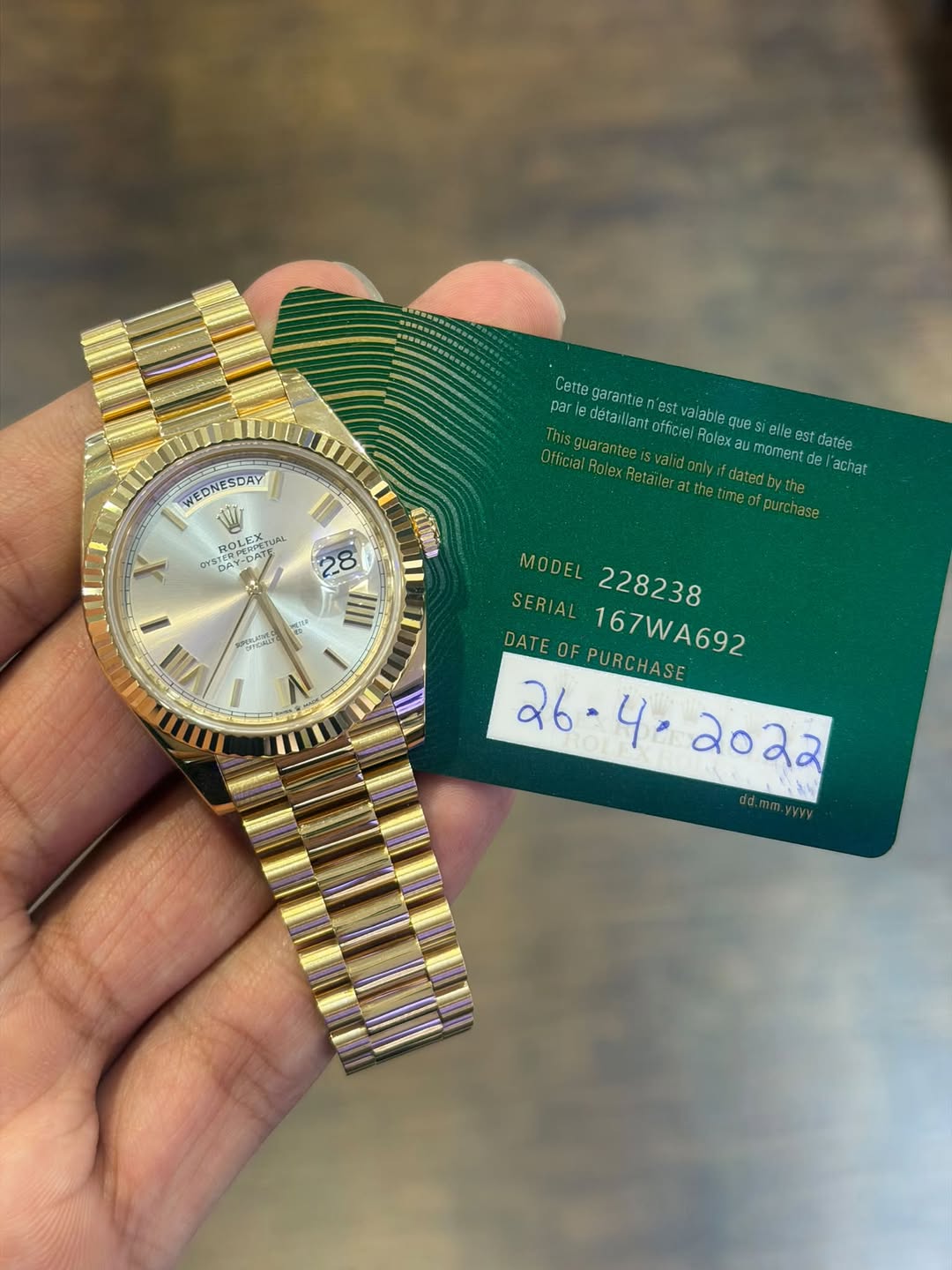 May be an image of wrist watch and text