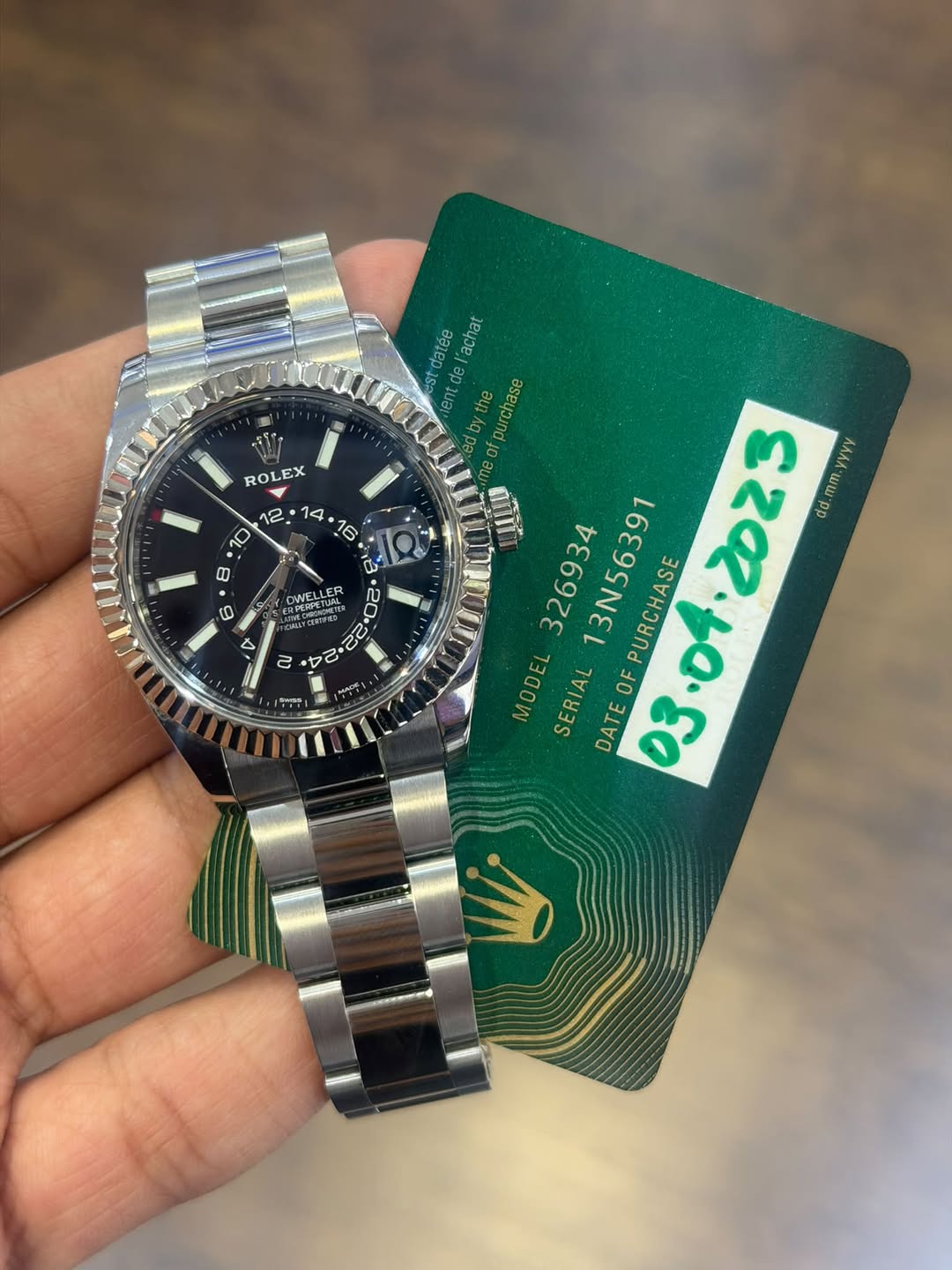 May be an image of wrist watch and text that says 'RO ROLEX EX X או X 0 使行U CWELTUR NNELL る a ai stdatée alhat orpurchase mm. dd 326934 13N56391 PURCHASE yyyy MODEL SERIAL OF…