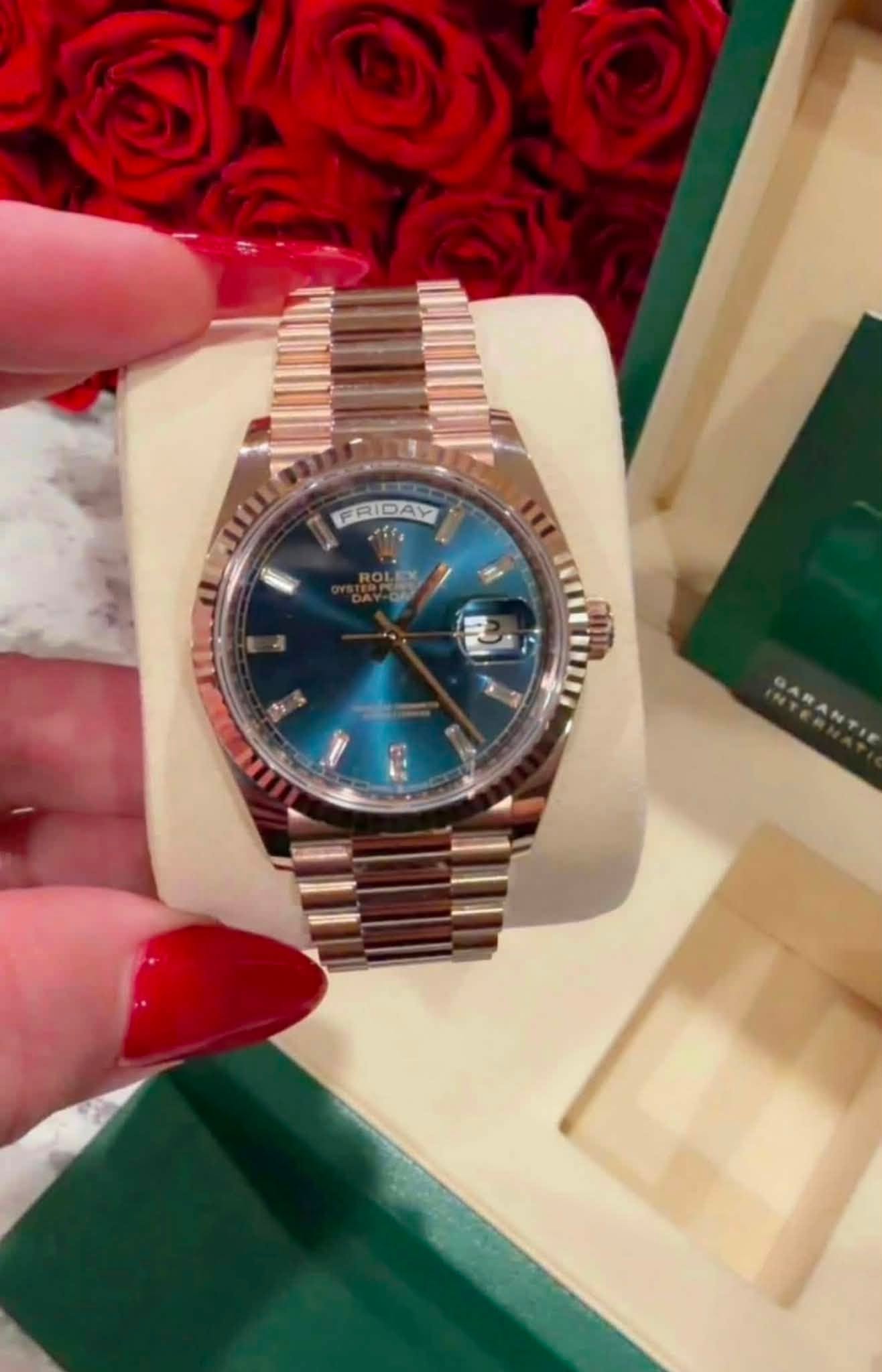 May be an image of wrist watch and text that says 'อ FRIC FRIDAY'