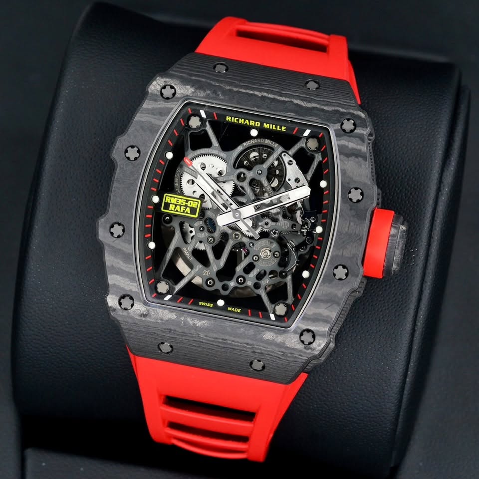 May be an image of wrist watch and text that says 'RIC RICHARD MILLE SUCHA MICLe RMES RAF - 0ር RMM 浜 SWISS MADE 南牛 I'