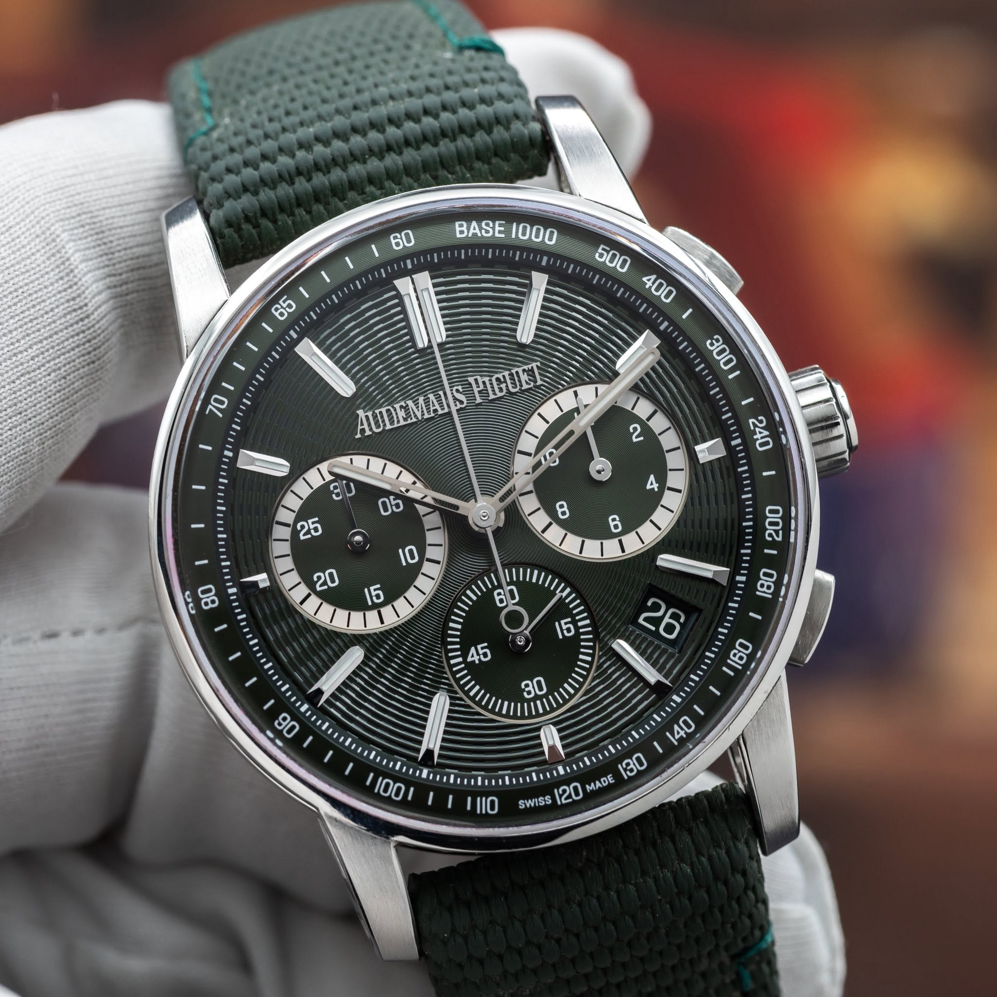 May be an image of wrist watch and text that says '60 BASE BASE1000 AUDEMAISPIGUET AUDEMAIS 白C酒 19 80 2 0b ម ו10ו 140 . SWISS 20 MADE '