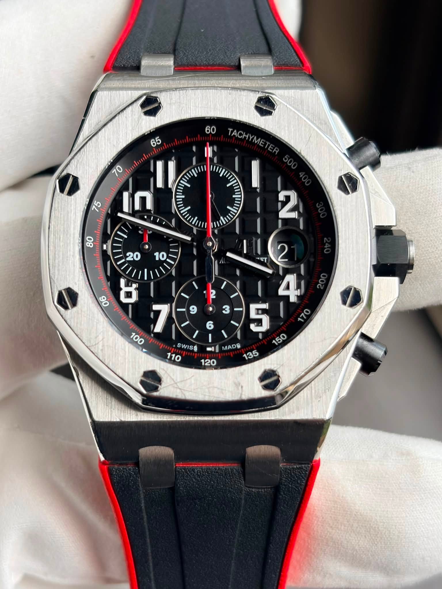 May be an image of wrist watch and text that says '60 65 TACHYME IIII "III 75 J 10 70 ? 80 I/ 20 06 06 o SWISS I ল • 3 3 6 I MADE 135 120 na REU'