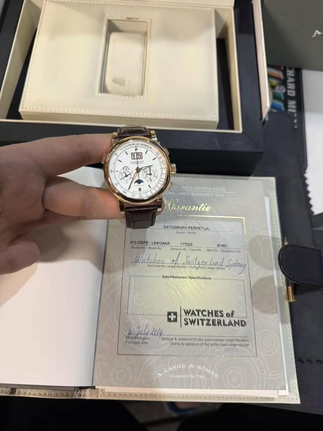 May be an image of wrist watch and text