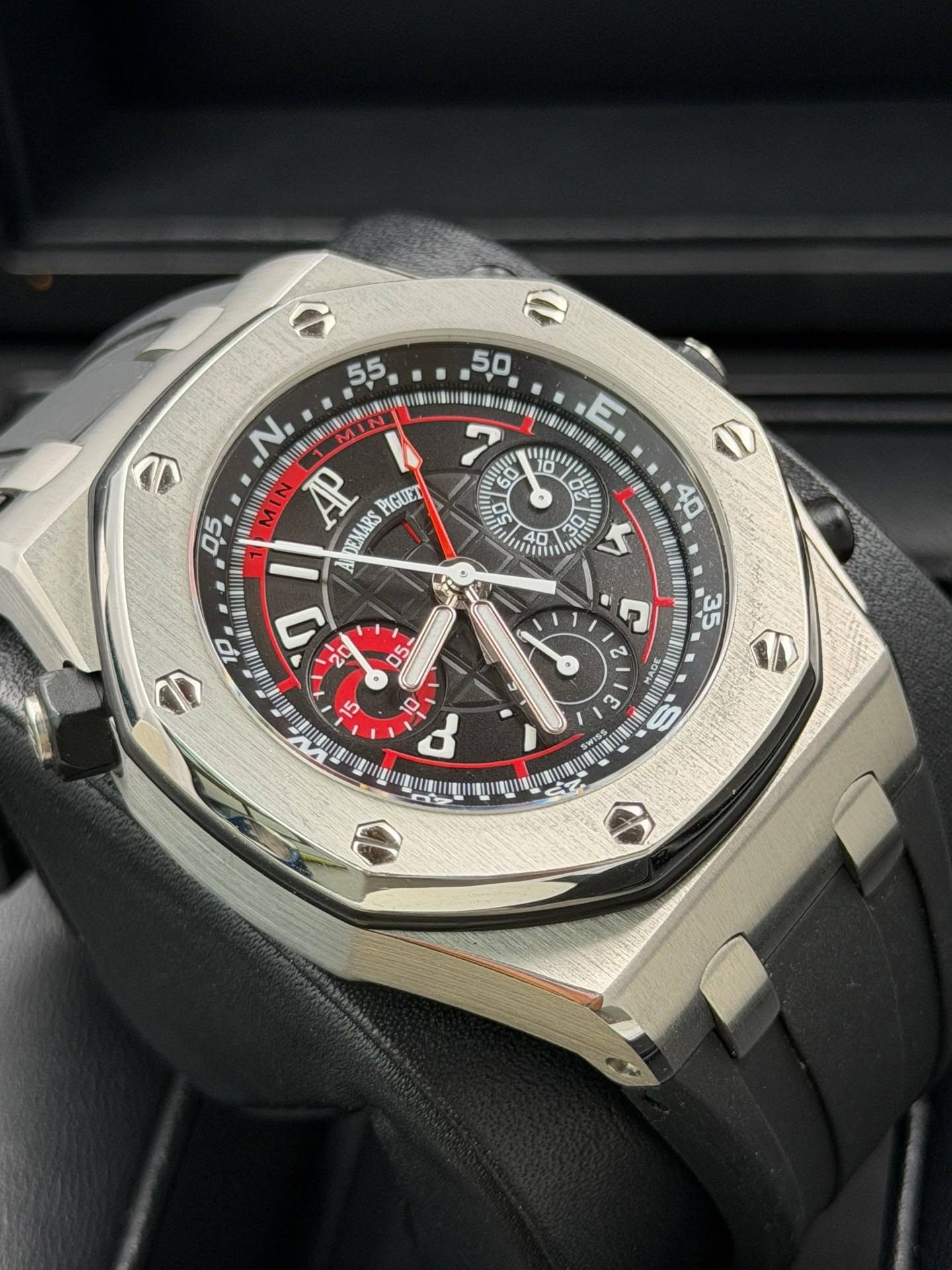 May be an image of wrist watch and text