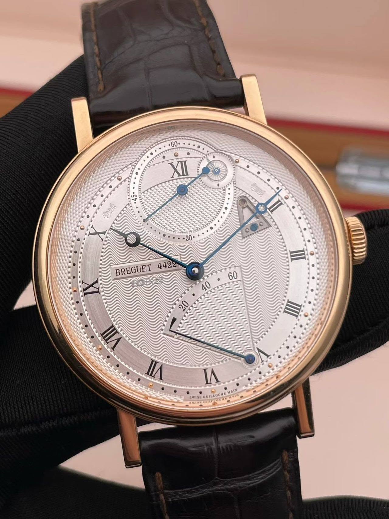 May be an image of wrist watch and text