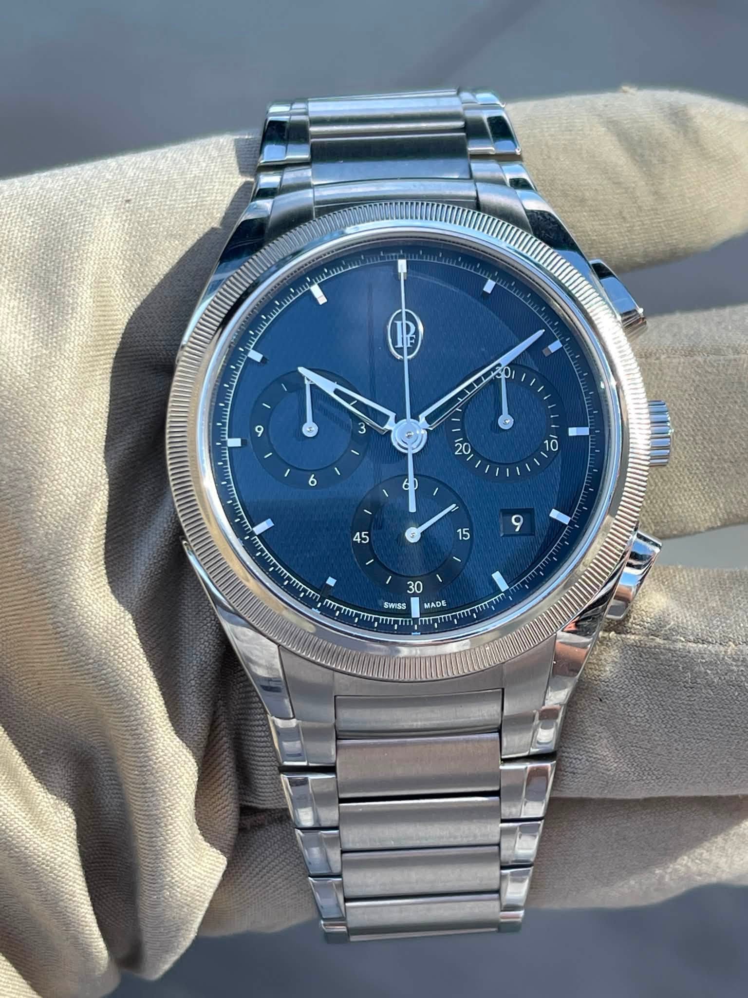 May be an image of wrist watch and text