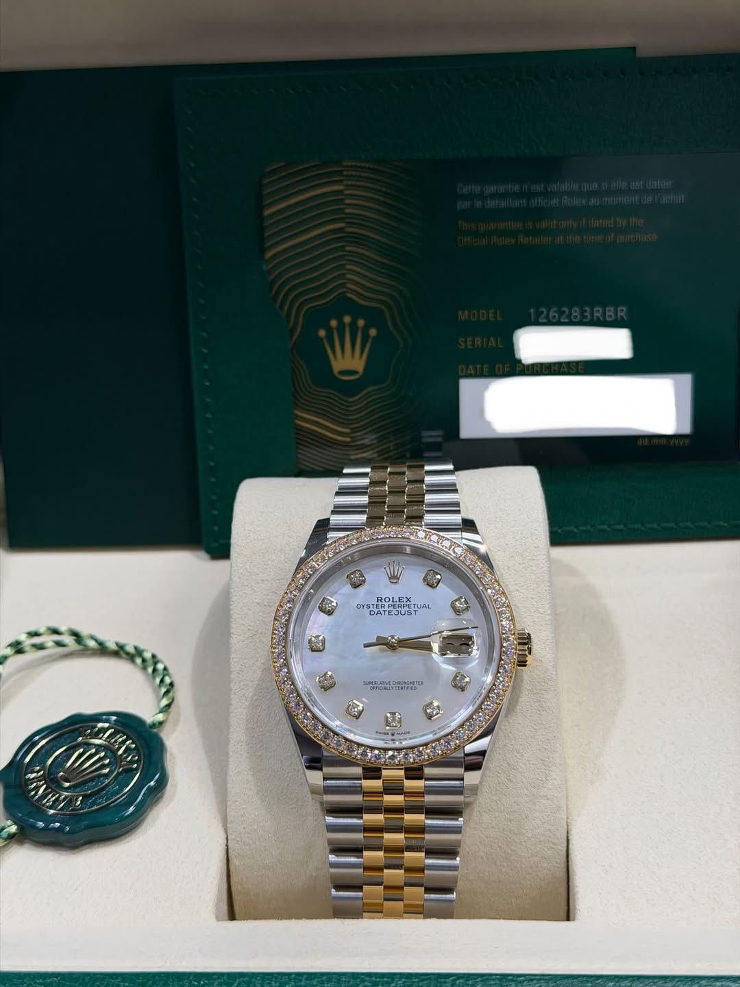 May be an image of wrist watch and text