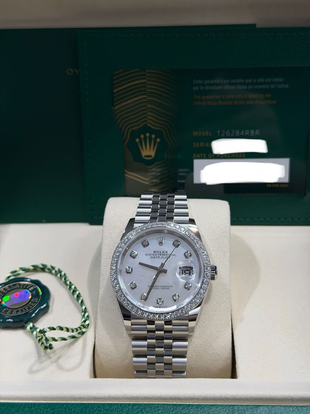 May be an image of wrist watch and text