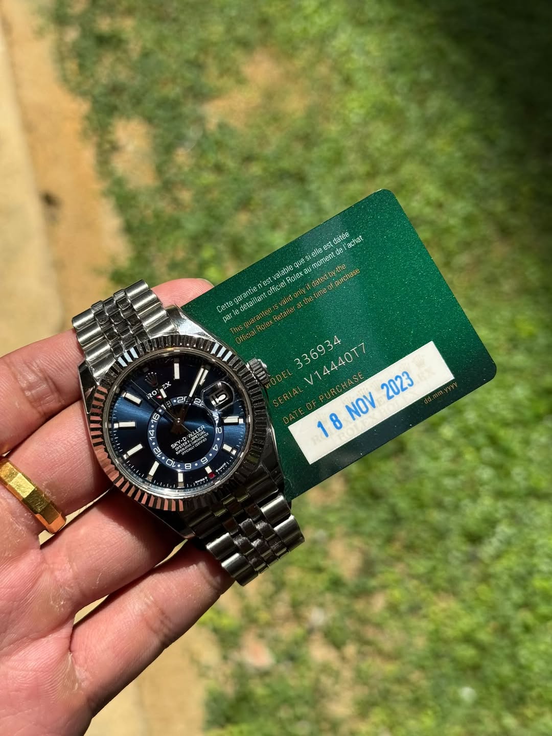 May be an image of wrist watch and text