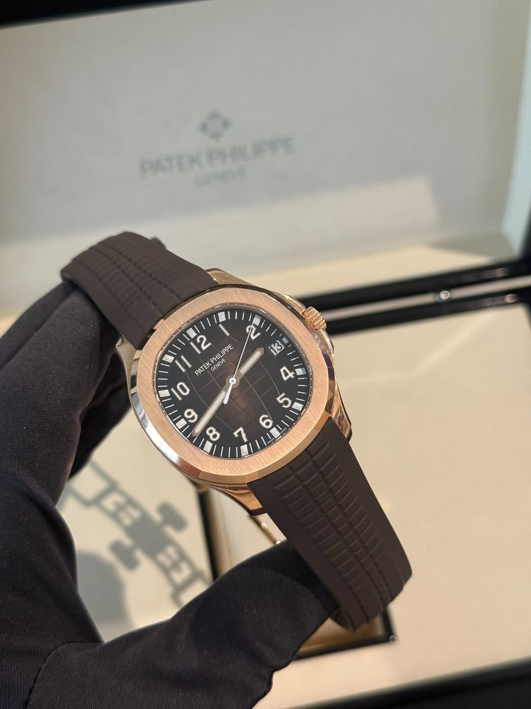 May be an image of wrist watch and text
