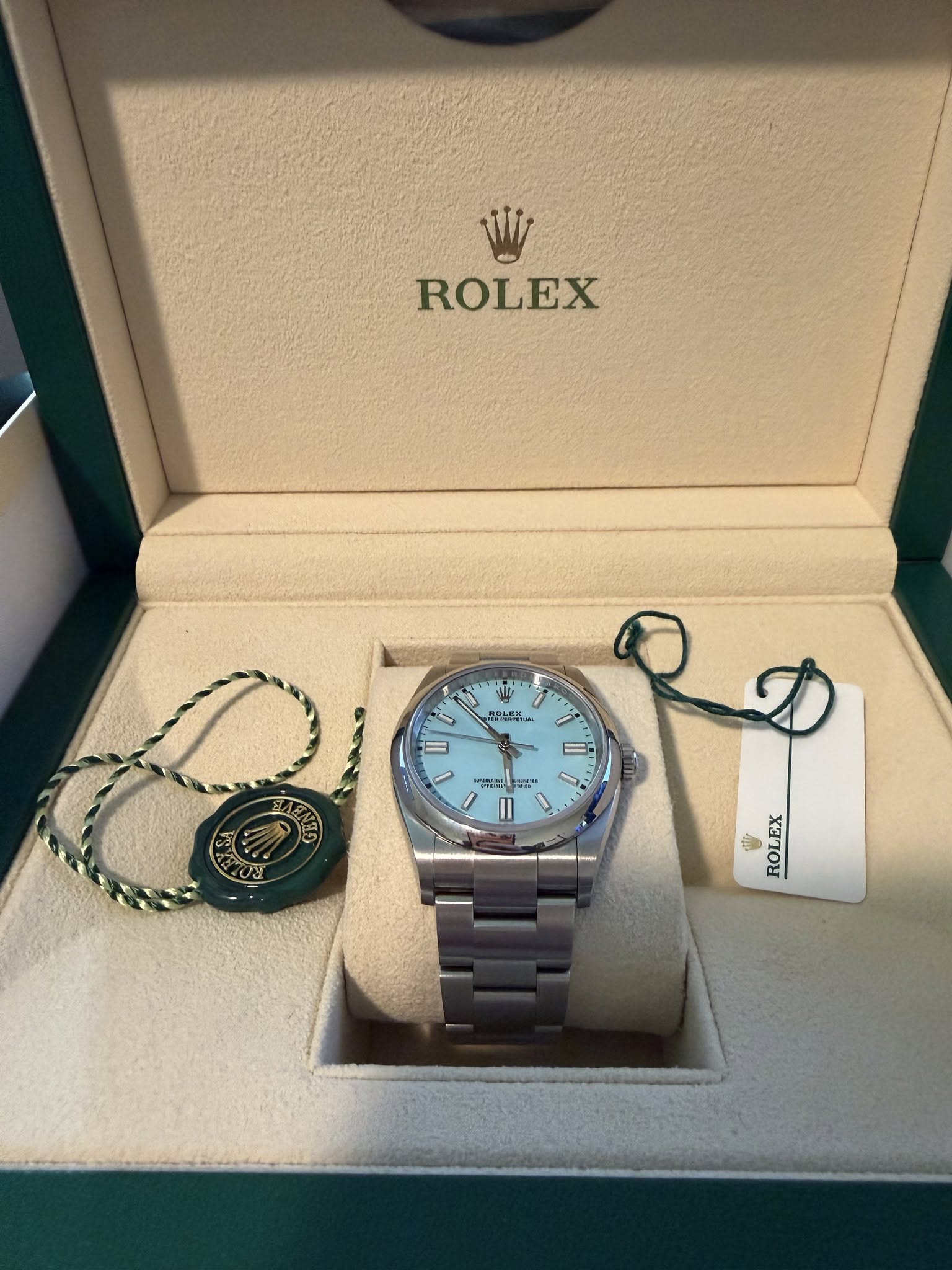 May be an image of wrist watch and text