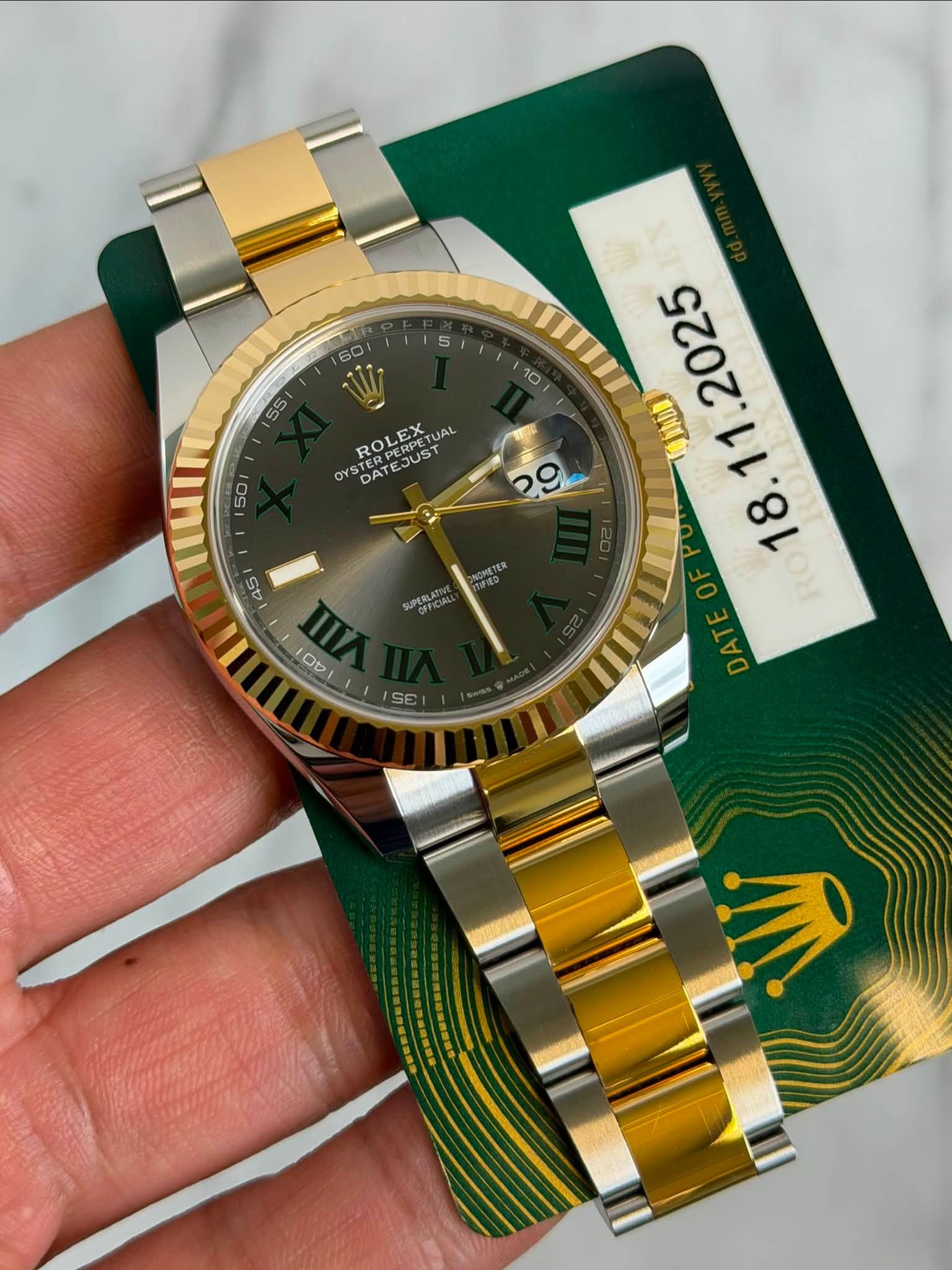 May be an image of wrist watch and text that says ' OYS STERP STER DAT DAT STEDDEDO ROLE ROLEX PERPETU EX JAL JUST DA 50 45 SUPERLATIN O OH Ob O0 S0'