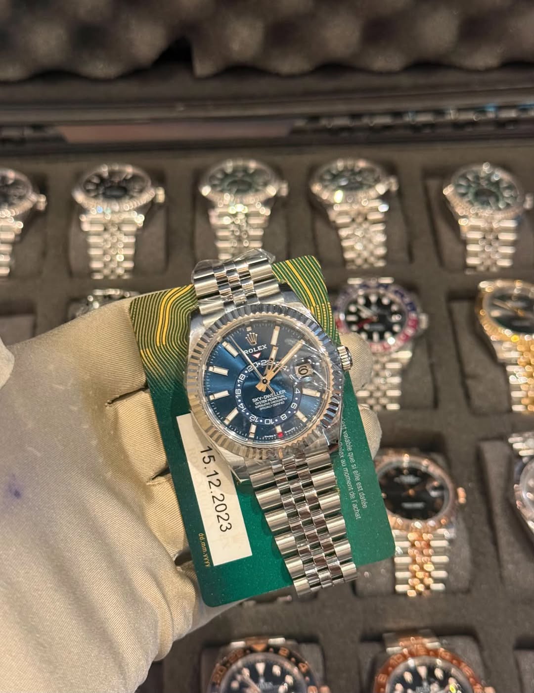 May be an image of wrist watch and text