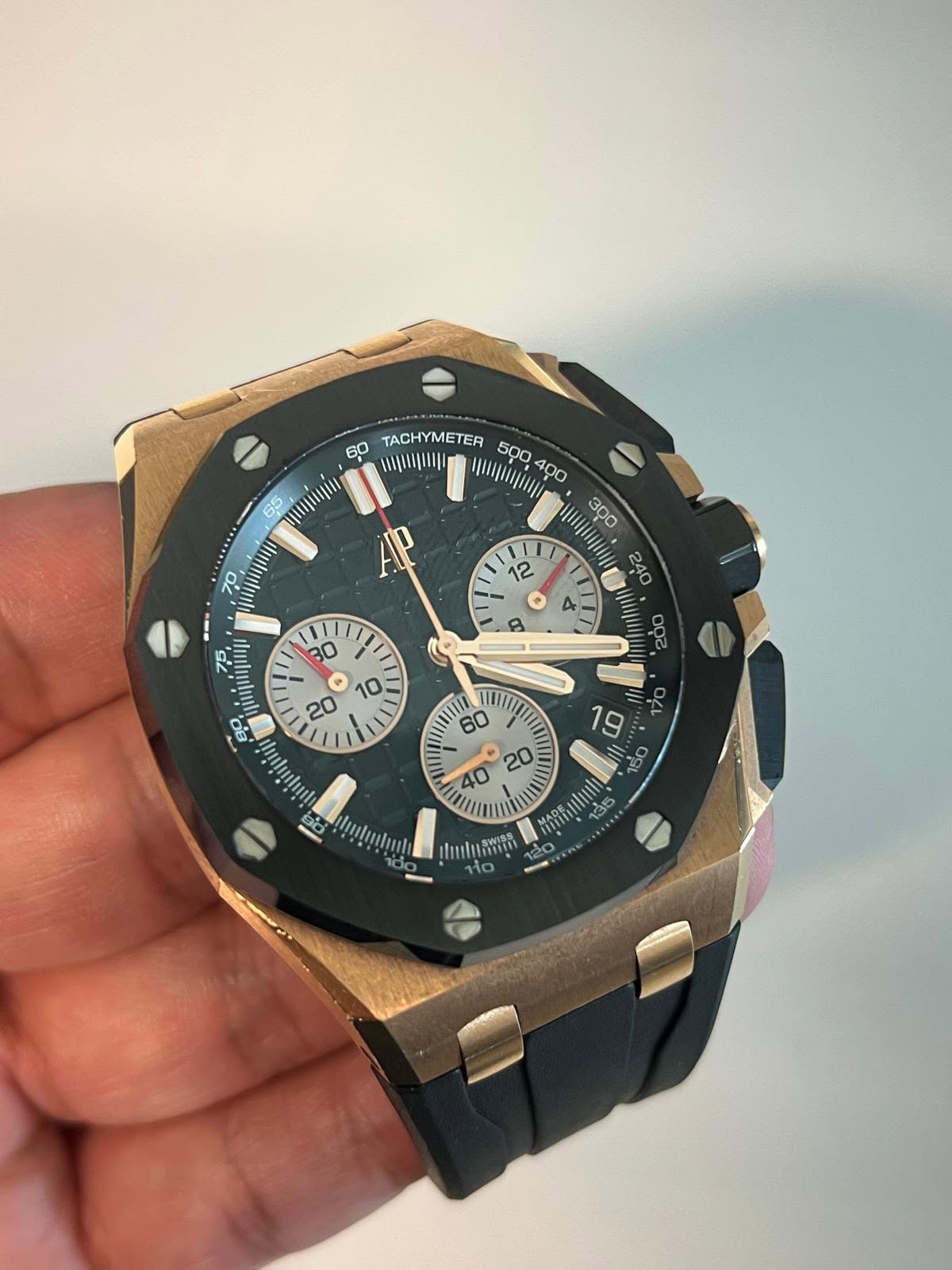 May be an image of wrist watch and text