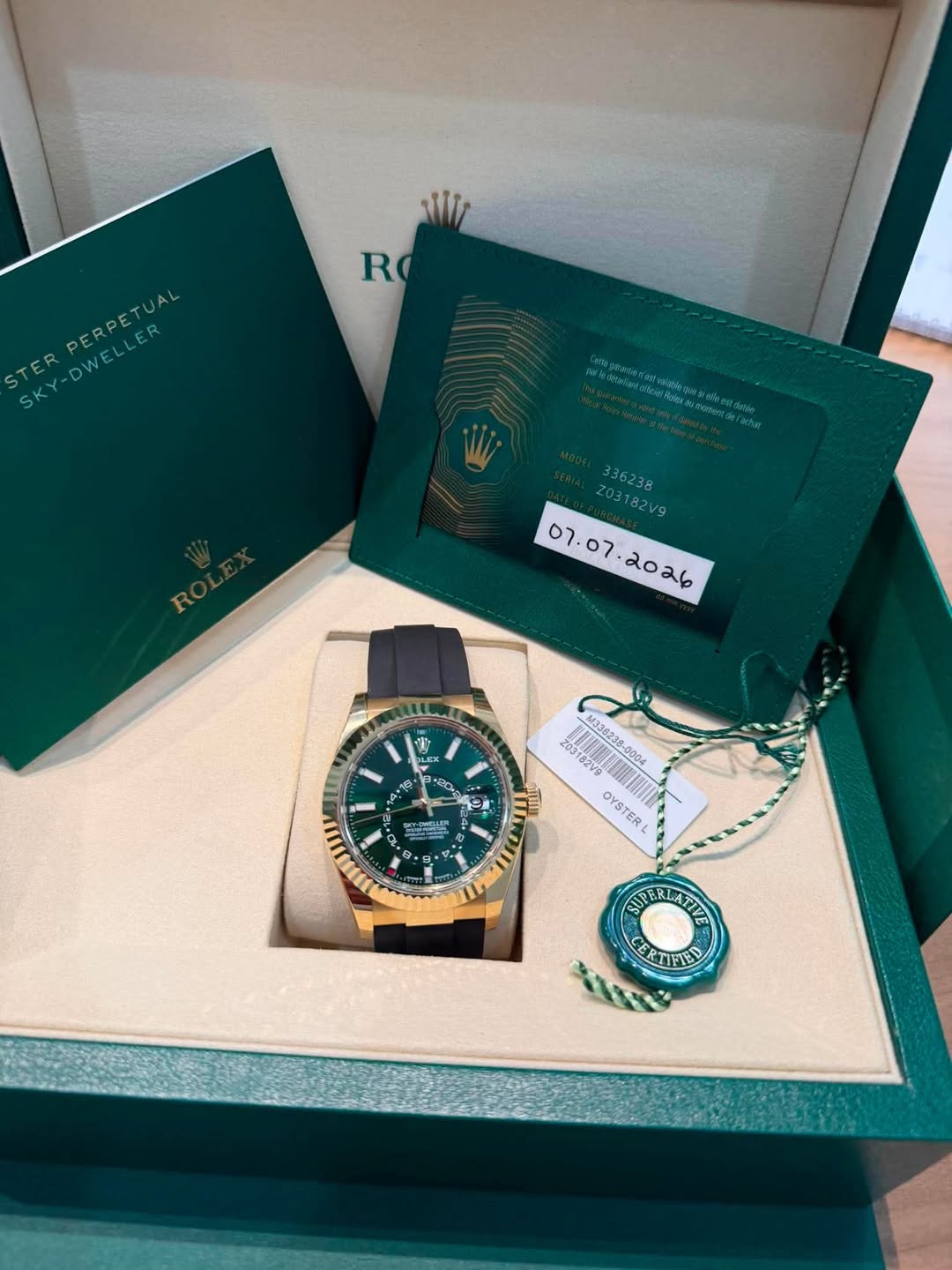 May be an image of wrist watch and text