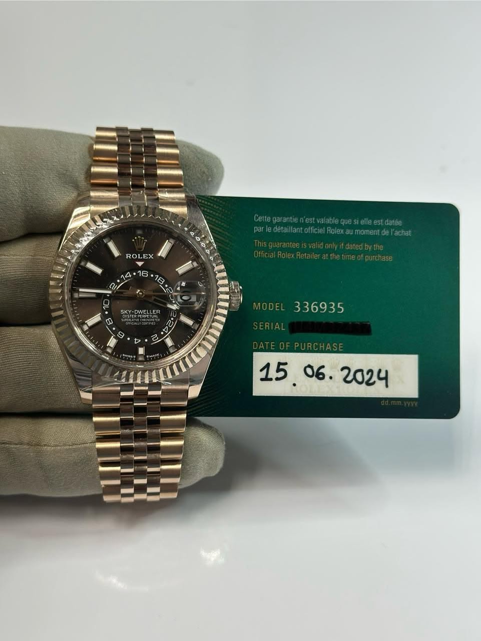 May be an image of wrist watch and text