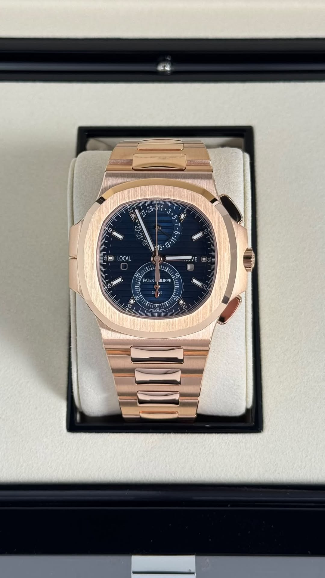 May be an image of wrist watch and text