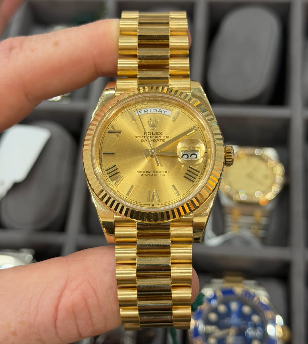 May be an image of wrist watch and text
