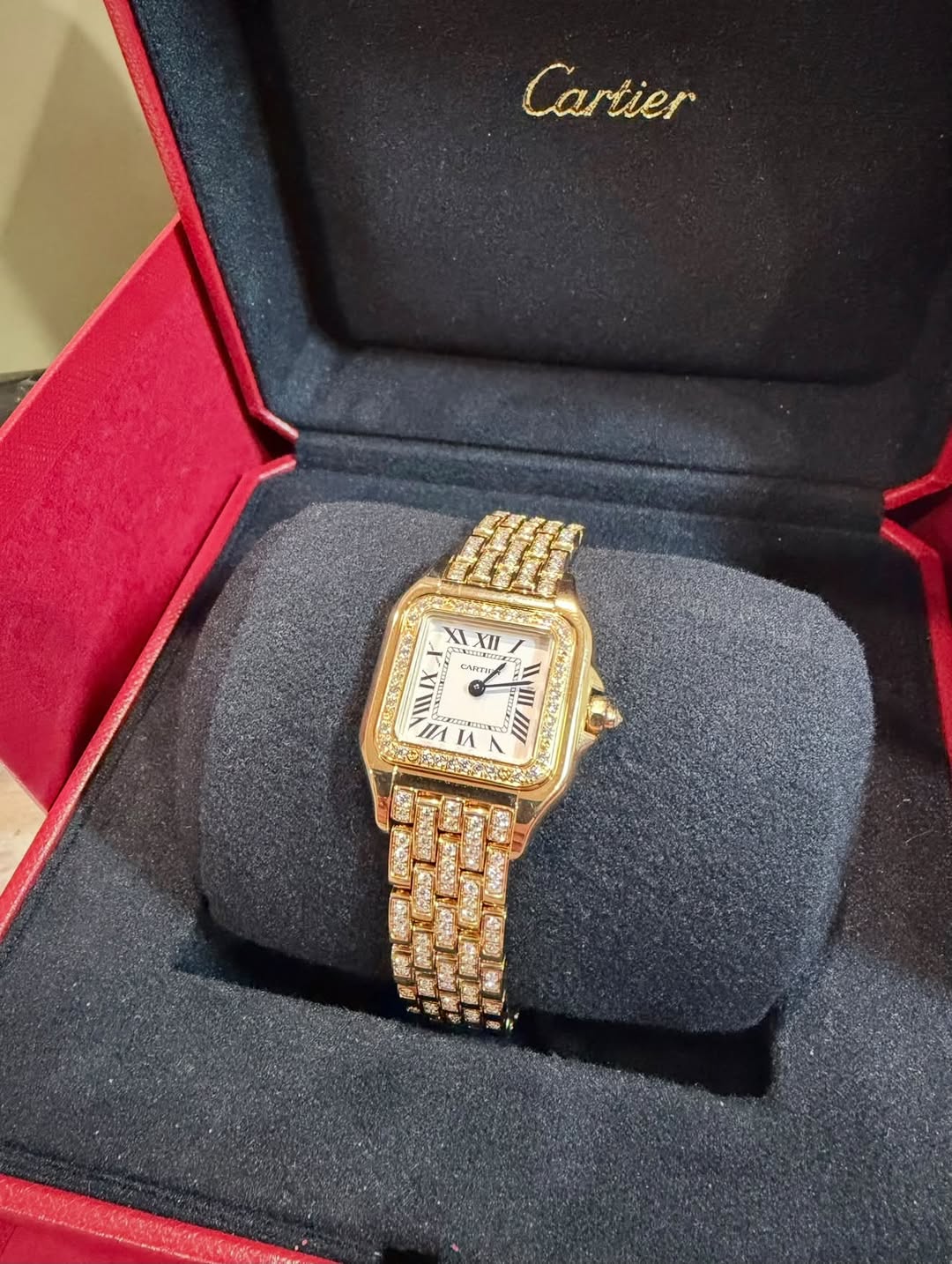 May be an image of wrist watch and text