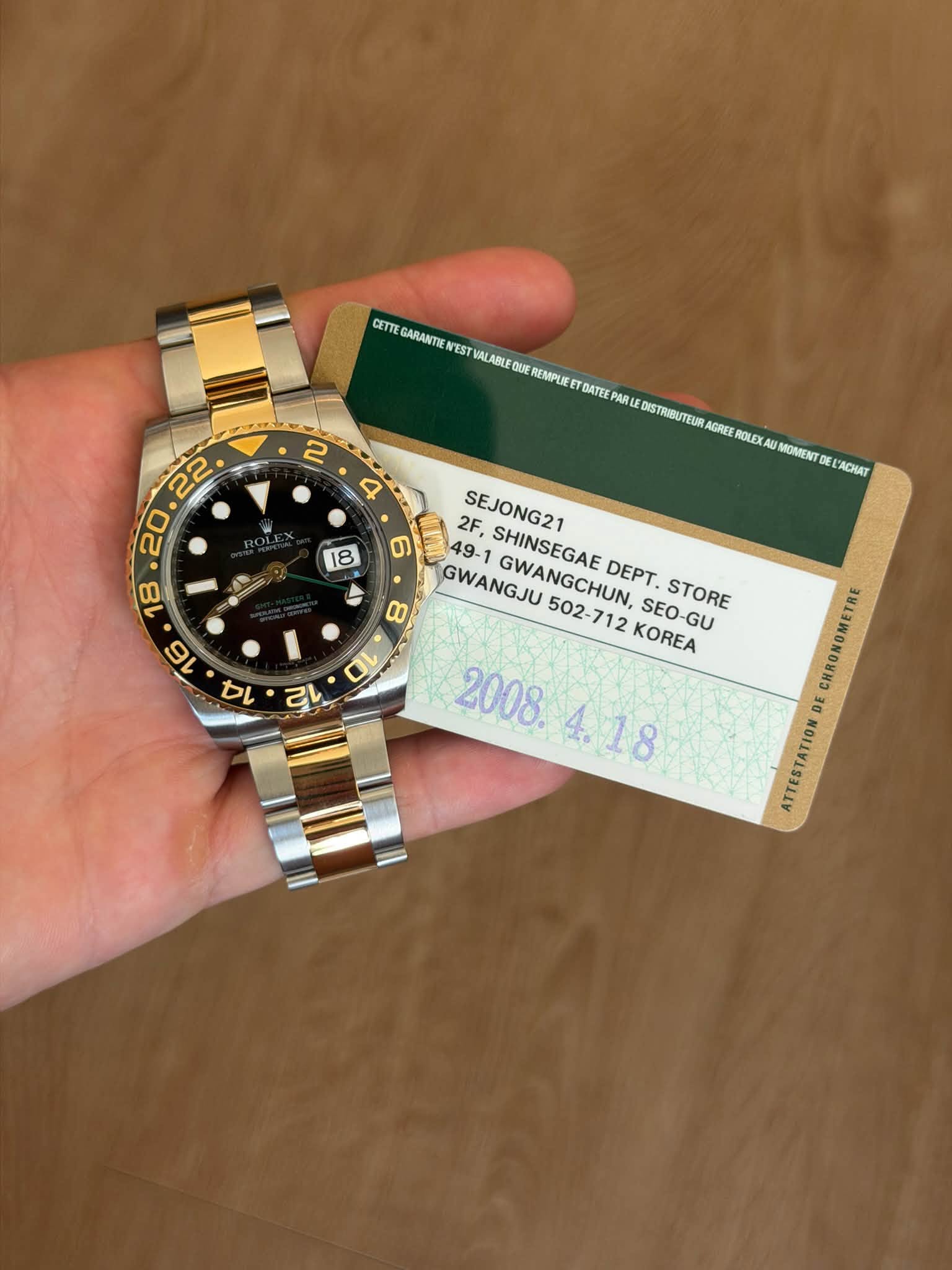 May be an image of wrist watch and text that says 'CETTE GARANTIE NEST VALARU LEQU DUE REMPLEET TOATEE PARLE DISTRIBUTEUR AGREE ROLEXAD MOMENT ACHAT 2 4 တ 실 2F, SHINSEGAE DEPT…