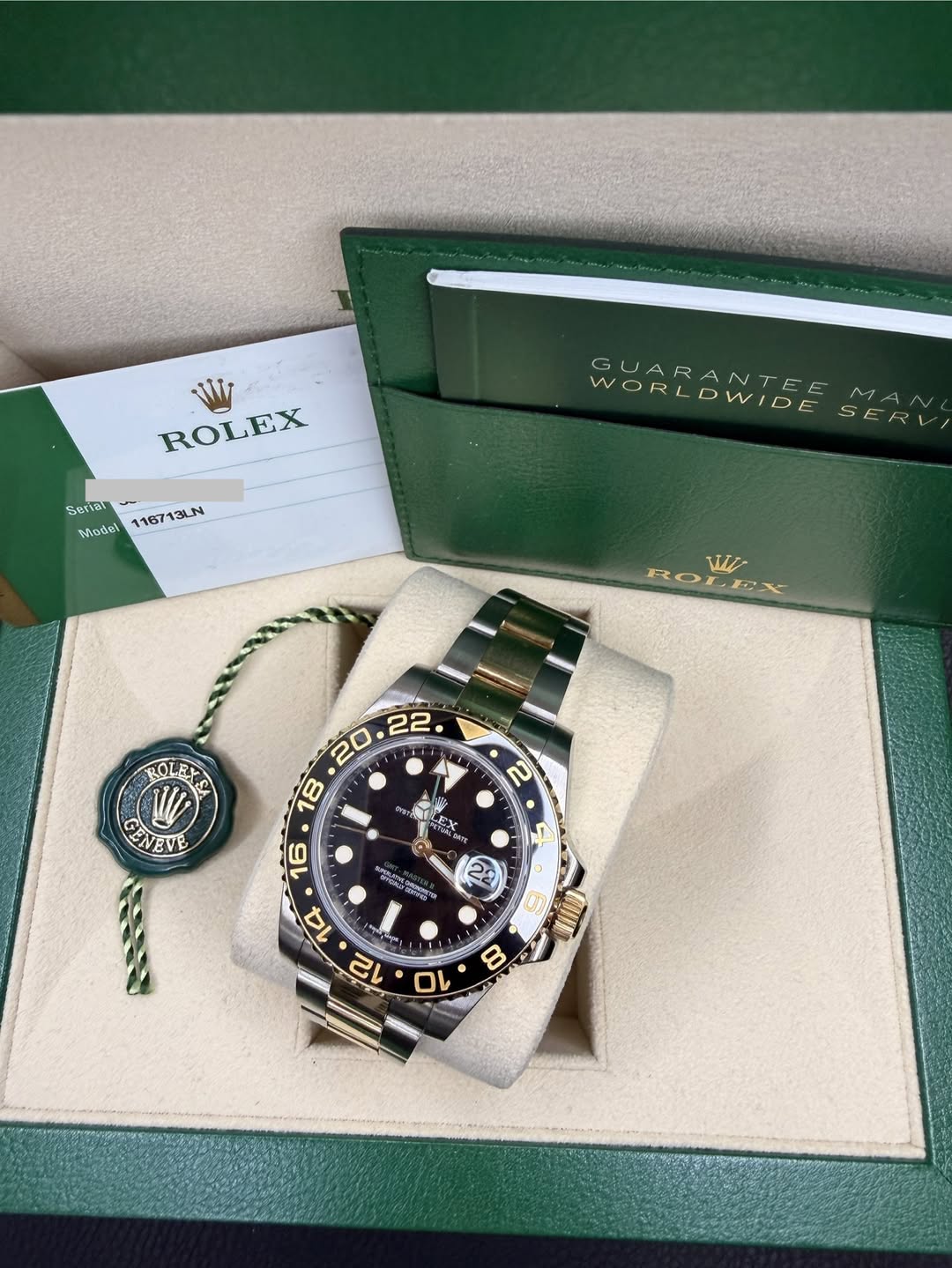 May be an image of wrist watch and text that says 'ROLEX SRIB Seriat Model 116713LN 3LN WORLDWIDE DWIDE SERV GUARANTEE WORL wz ROLEX ROLEY ROL GENEVE . 福 ※入通がー料 EX N 22 16 C 14 12…