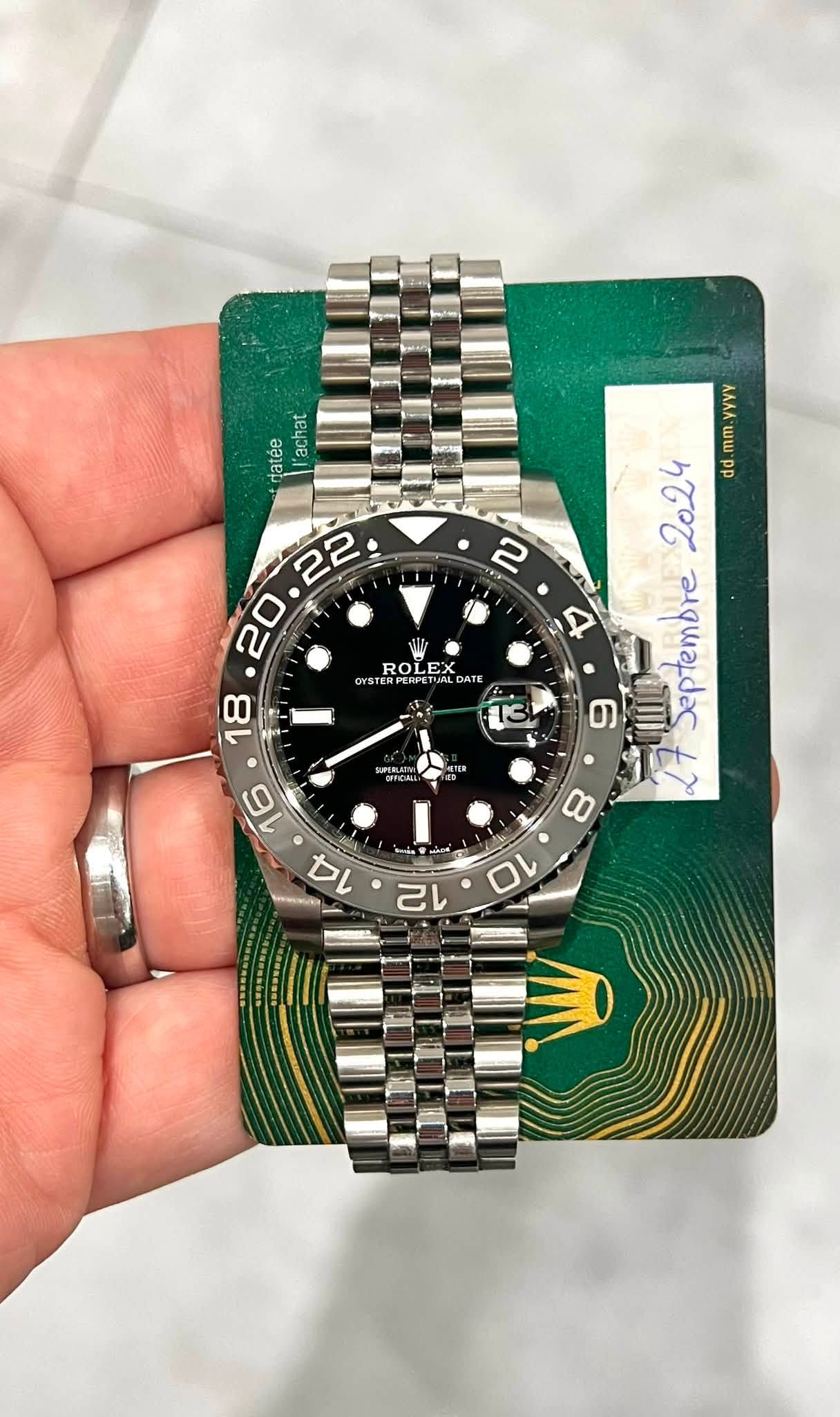 May be an image of wrist watch and text that says 'datée n achat VVVY mm حمه dd d 22 20 i 2 4 ROLEX ROL CETALDATE DATE OYS 13 18 RAPERLAI TER 6 t7 16 14 Sa 8 12 10'