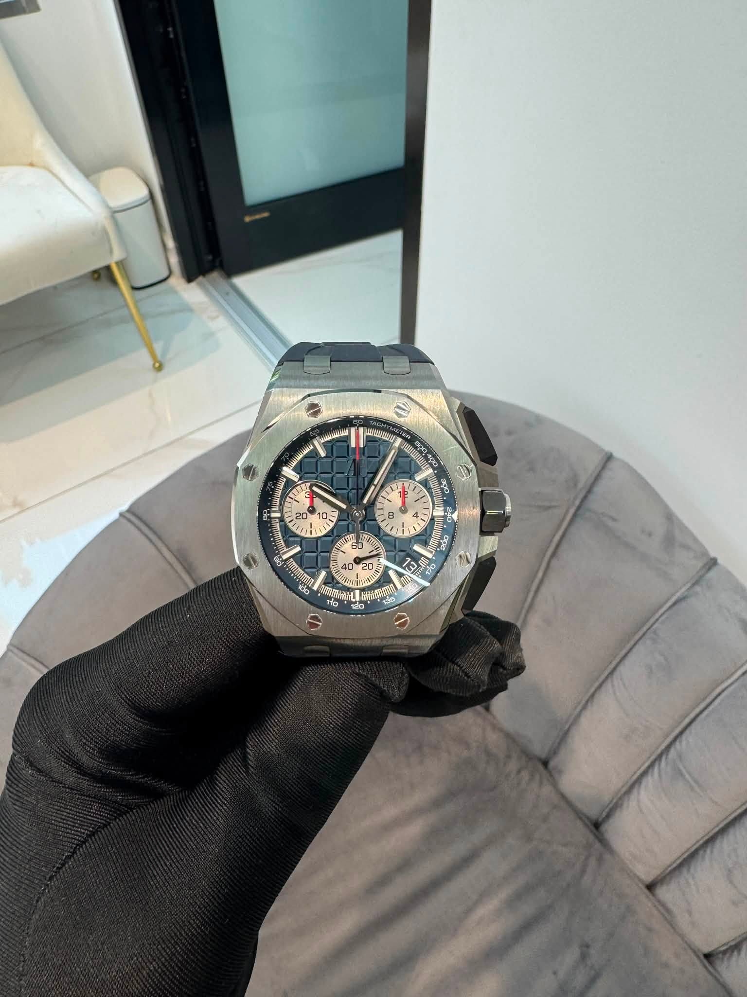 May be an image of wrist watch and text