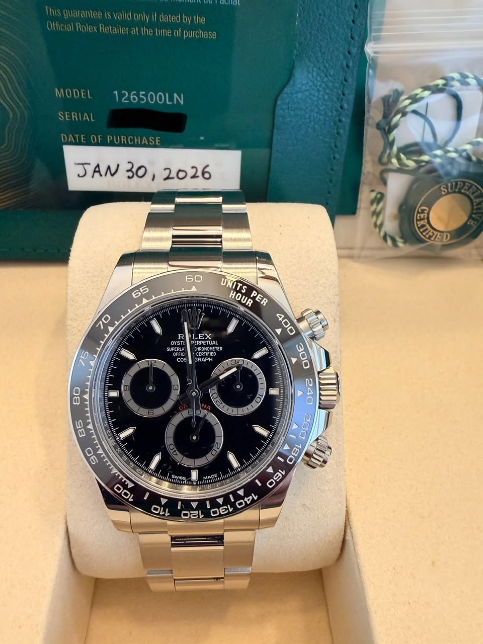 May be an image of wrist watch and text