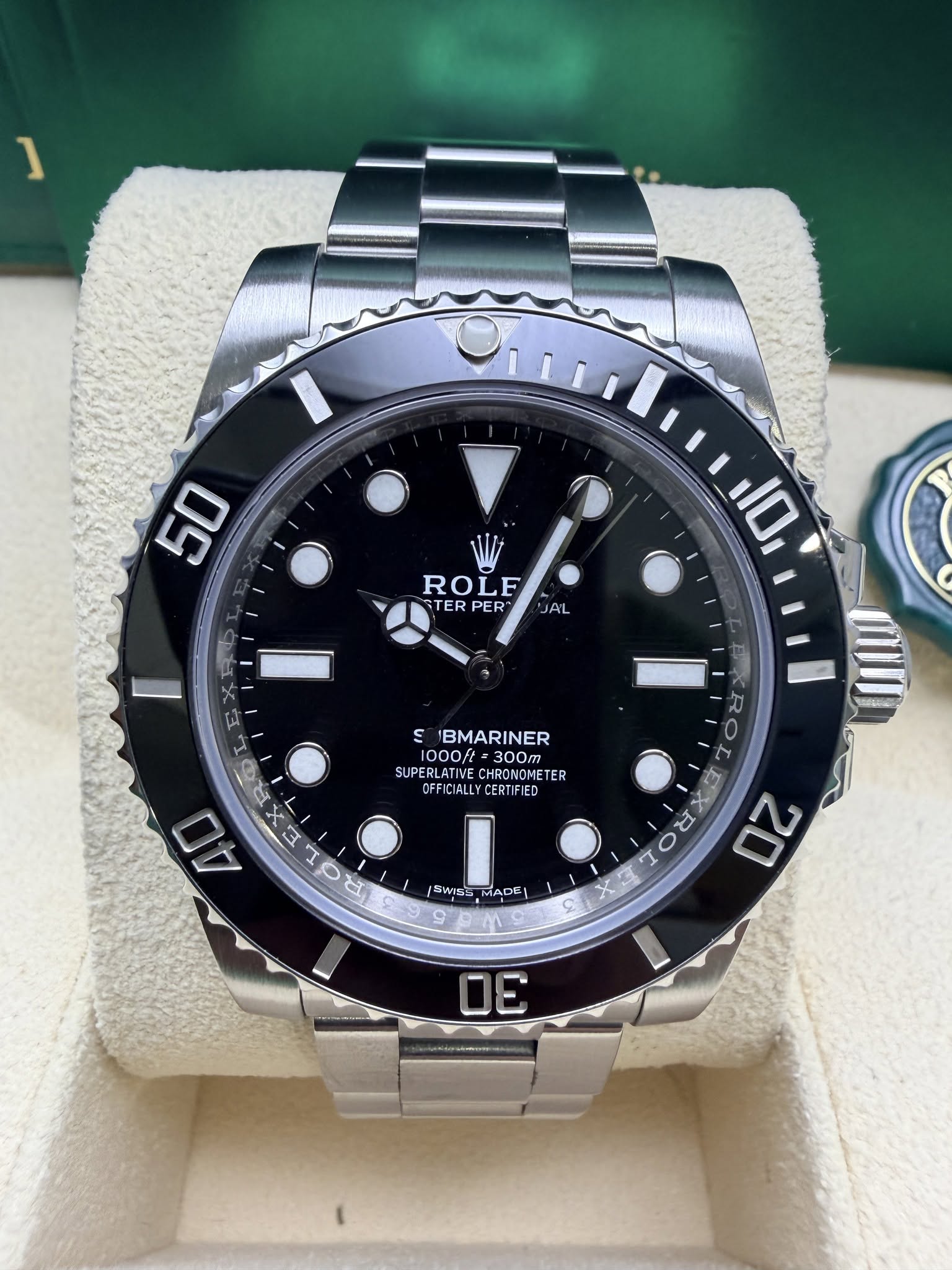 May be an image of wrist watch and text that says 'ROLE STER PER" JA'L EN A S IBMARINER 1000ft =300m SUPERLATIVE CHRONOMETE CIALLYCERTIFIED IED O እና ・ 40 A 4 10 R לל F にWは MADE…