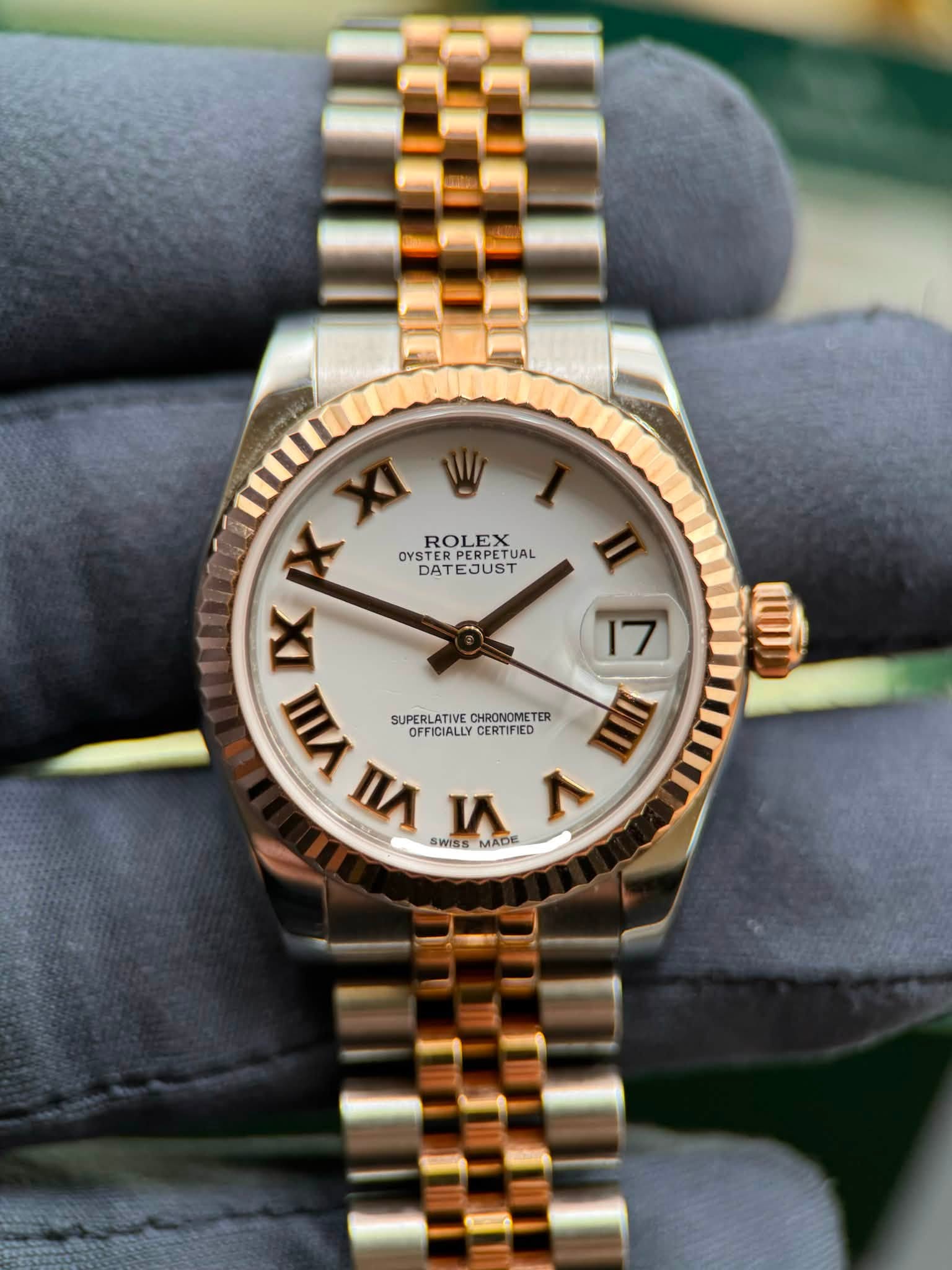 May be an image of wrist watch and text that says 'ROLEX OYSTE OYSTERPE STERPERPETI PERPETUAL UAL PERPETUA DATEJUST DATE + IXX X XI W VIII SUPERLATIVE CHRONOMETE SUPELATIR ER…