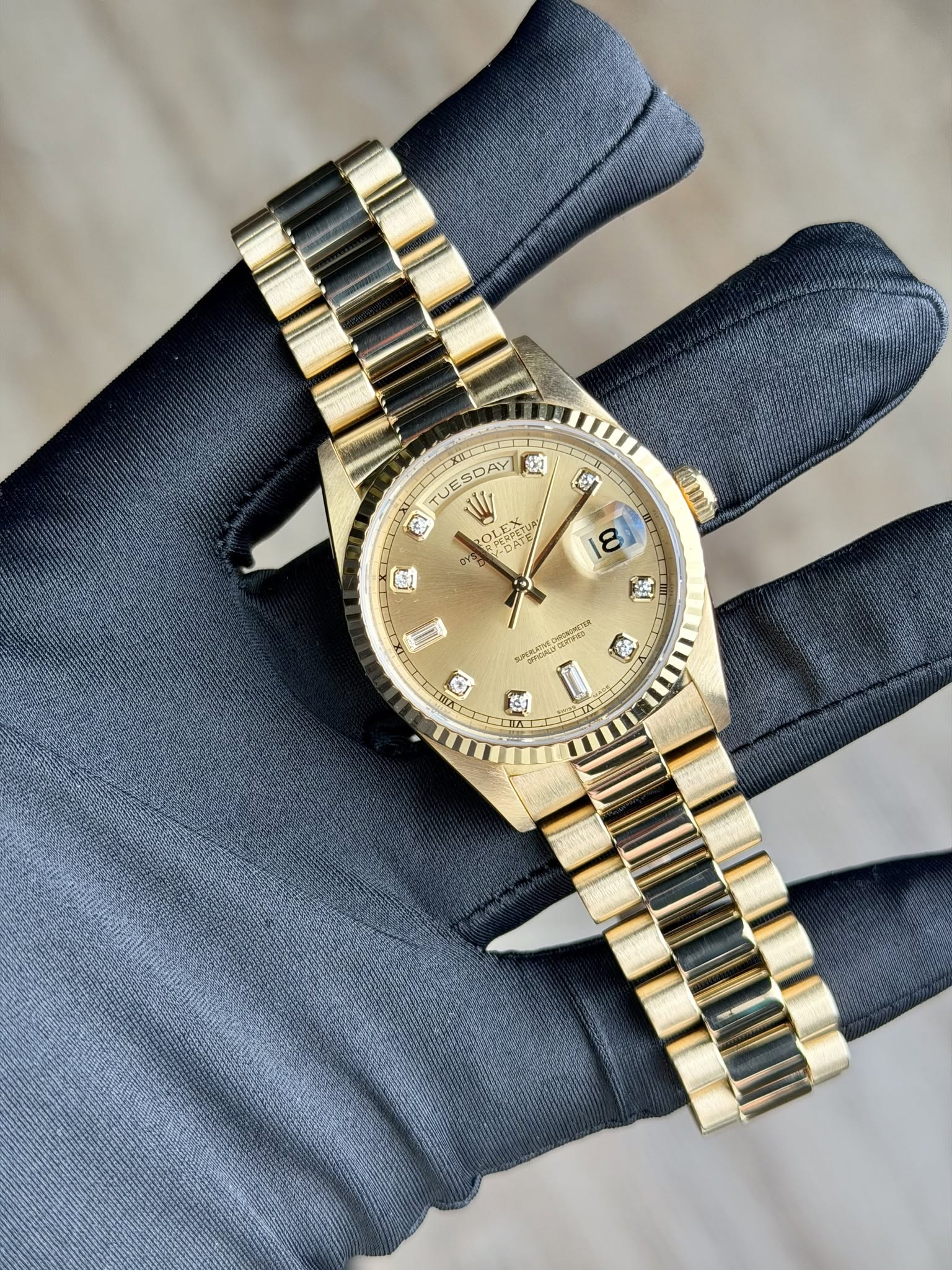 May be an image of wrist watch and text