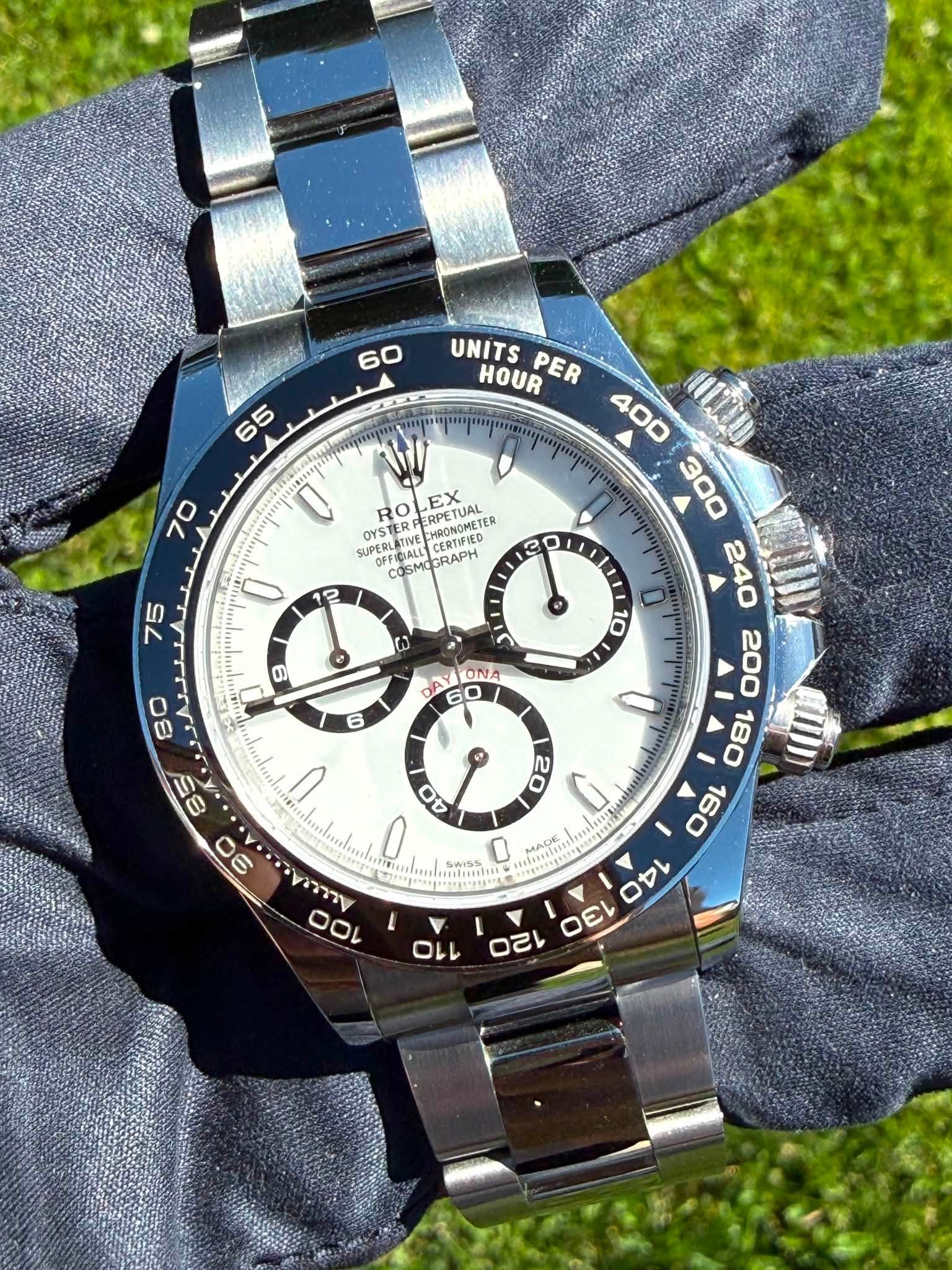 May be an image of wrist watch and text
